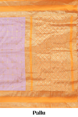 Pale lavender checked floral zari design semi soft silk saree with contrast bentex border and floral motifs blouse