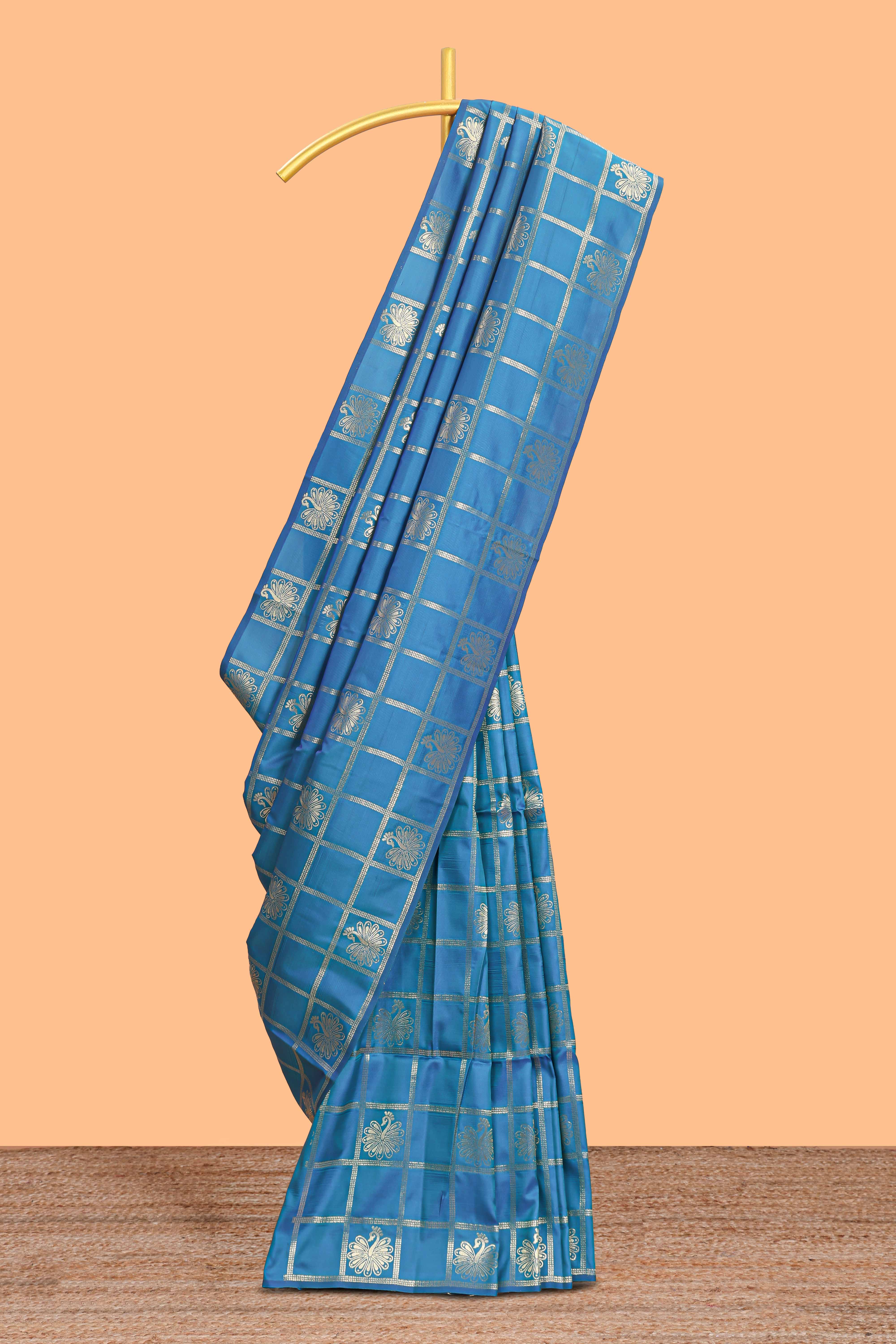 Borderless blue checked floral motifs zari design semi soft silk saree with matching zari motifs blouse