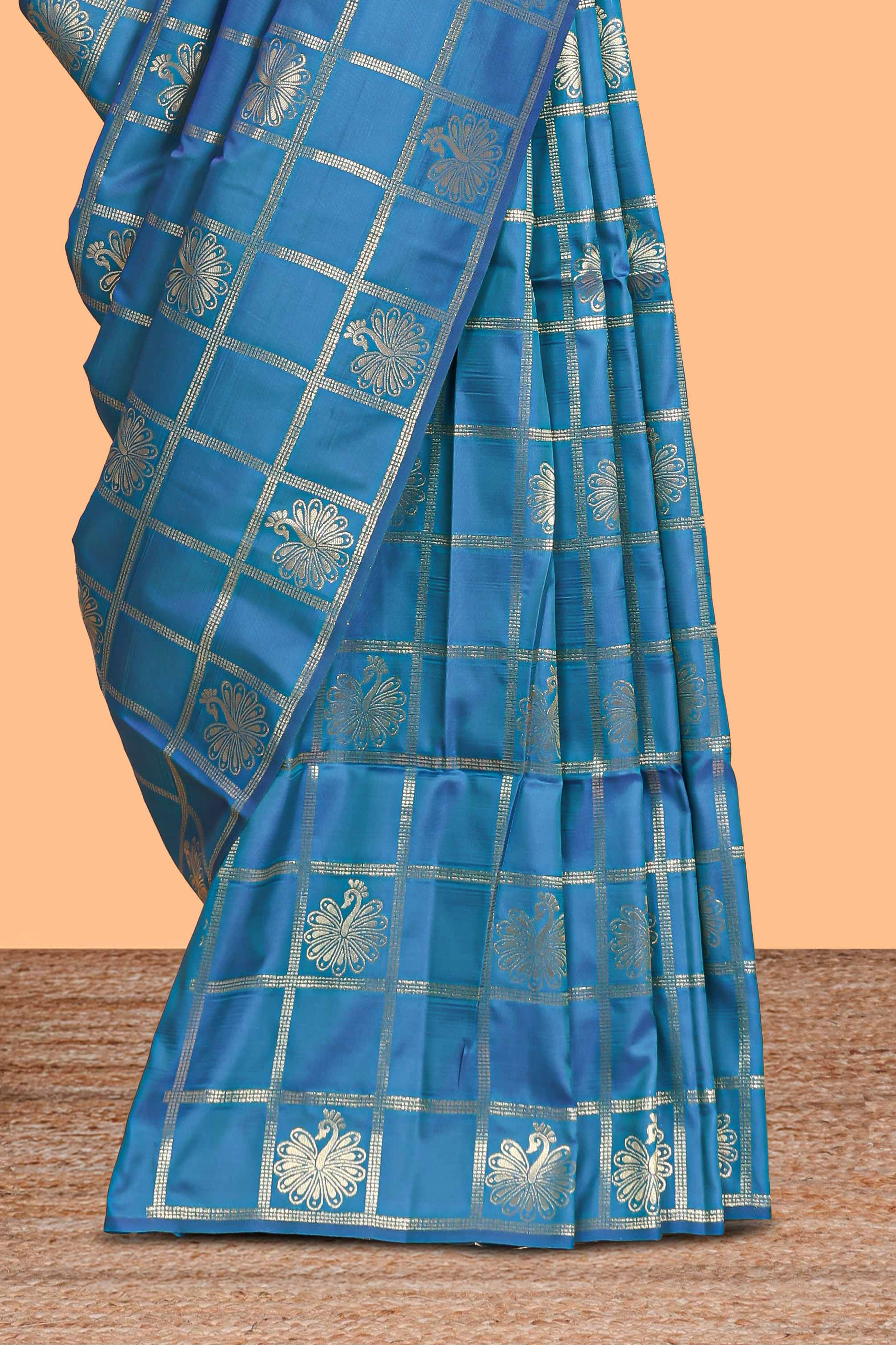 Borderless blue checked floral motifs zari design semi soft silk saree with matching zari motifs blouse
