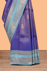 Blue checked floral motifs design semi soft silk saree with contrast zari border and floral motifs blouse