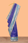 Blue checked semi soft silk saree with contrast zari border and floral motifs blouse