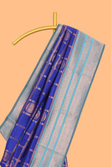 Blue checked floral design motifs semi soft silk saree with contrast zari border and floral motifs blouse
