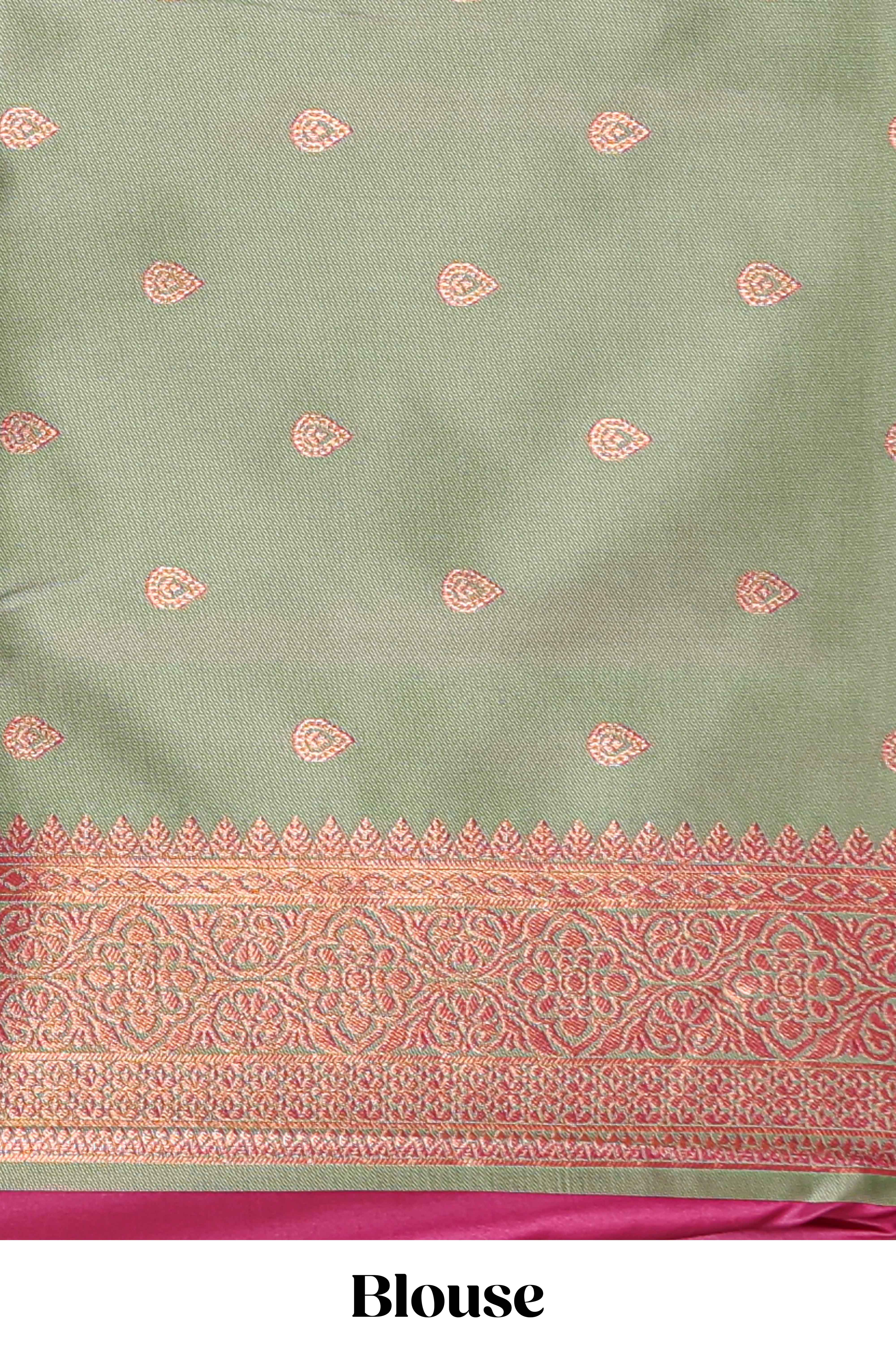 Magenta colour semi soft silk saree with contrast paisely border and contrast zari buttas blouse