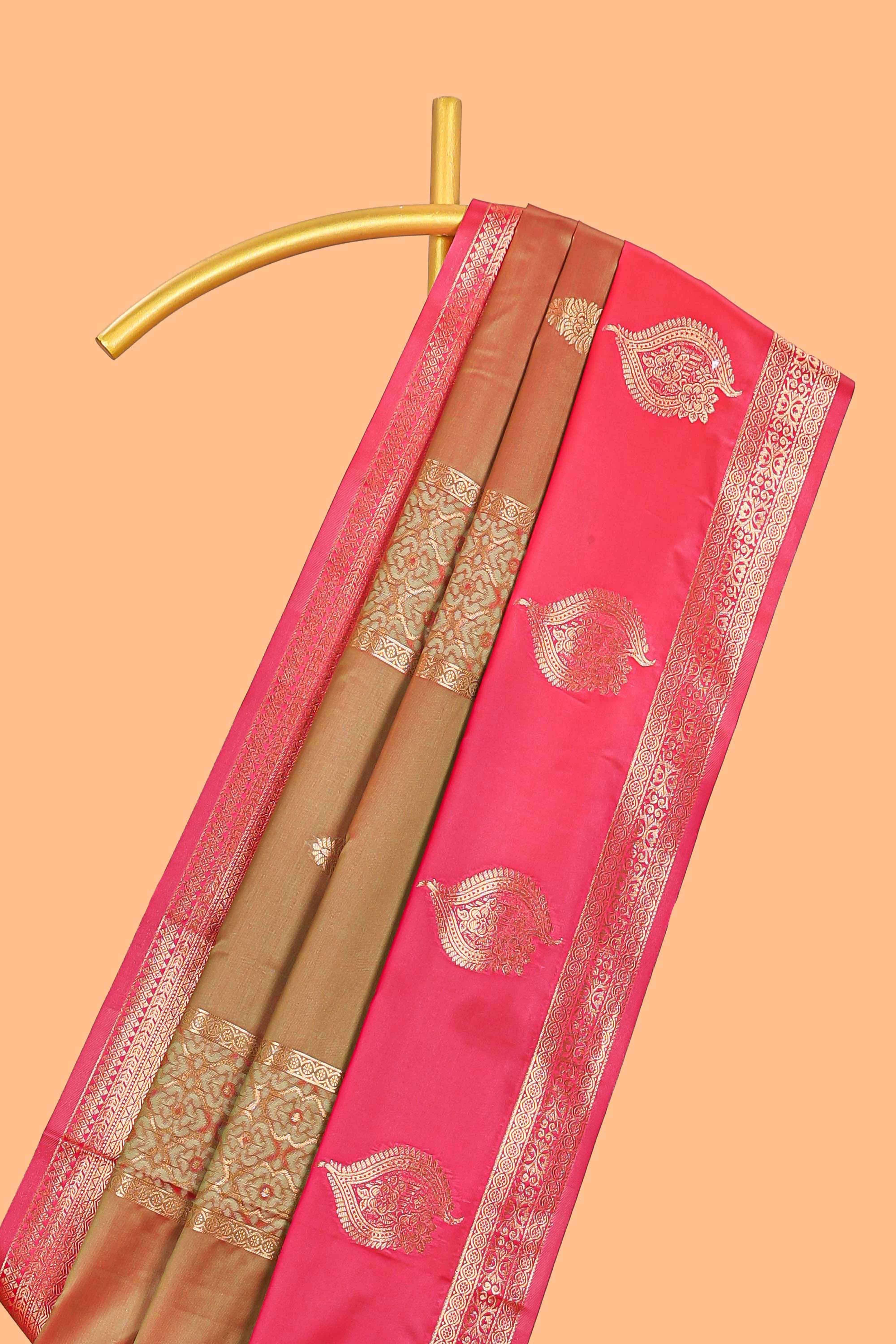 Soft silk saree with zari paisley goldenzari motifs and rich zari pallu with contrast big border