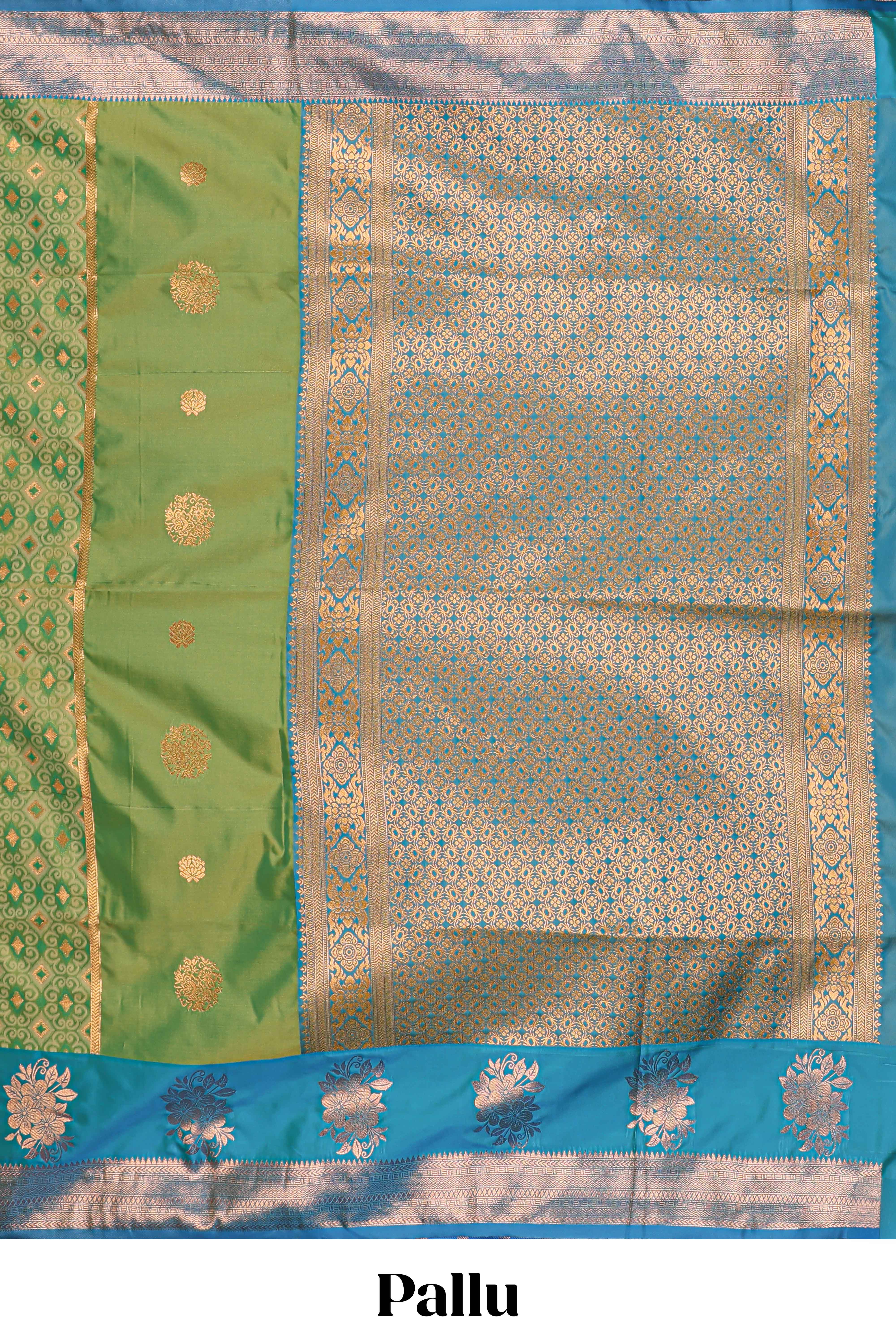 Green Semi soft silk sareecopperzari motifs with contrast border and pallu with a matchingblouse