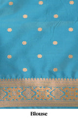 Green Semi soft silk sareecopperzari motifs with contrast border and pallu with a matchingblouse