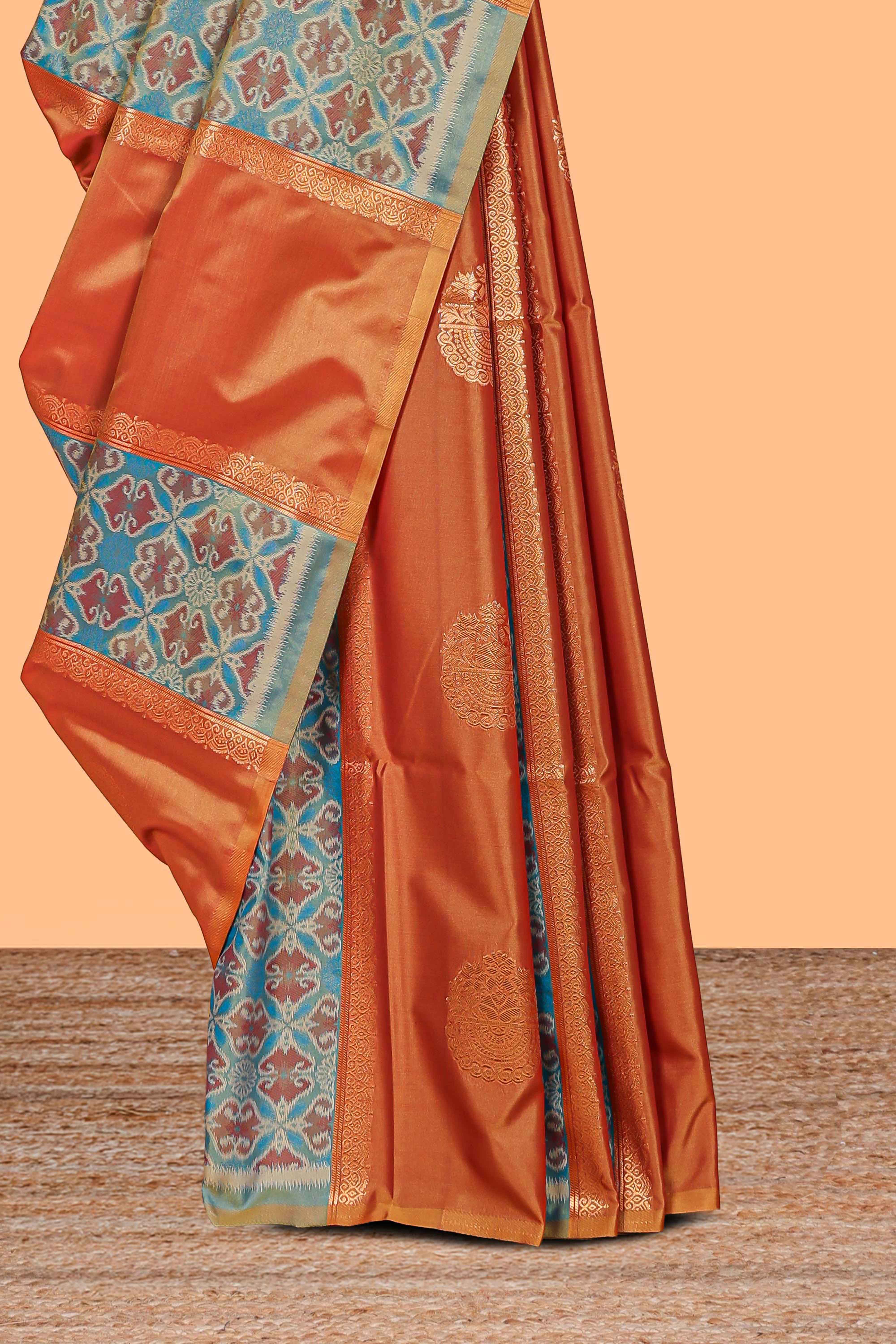 Rust orange semi soft silk saree patola printed body with zari border and rich contrast pallu with contrast blouse