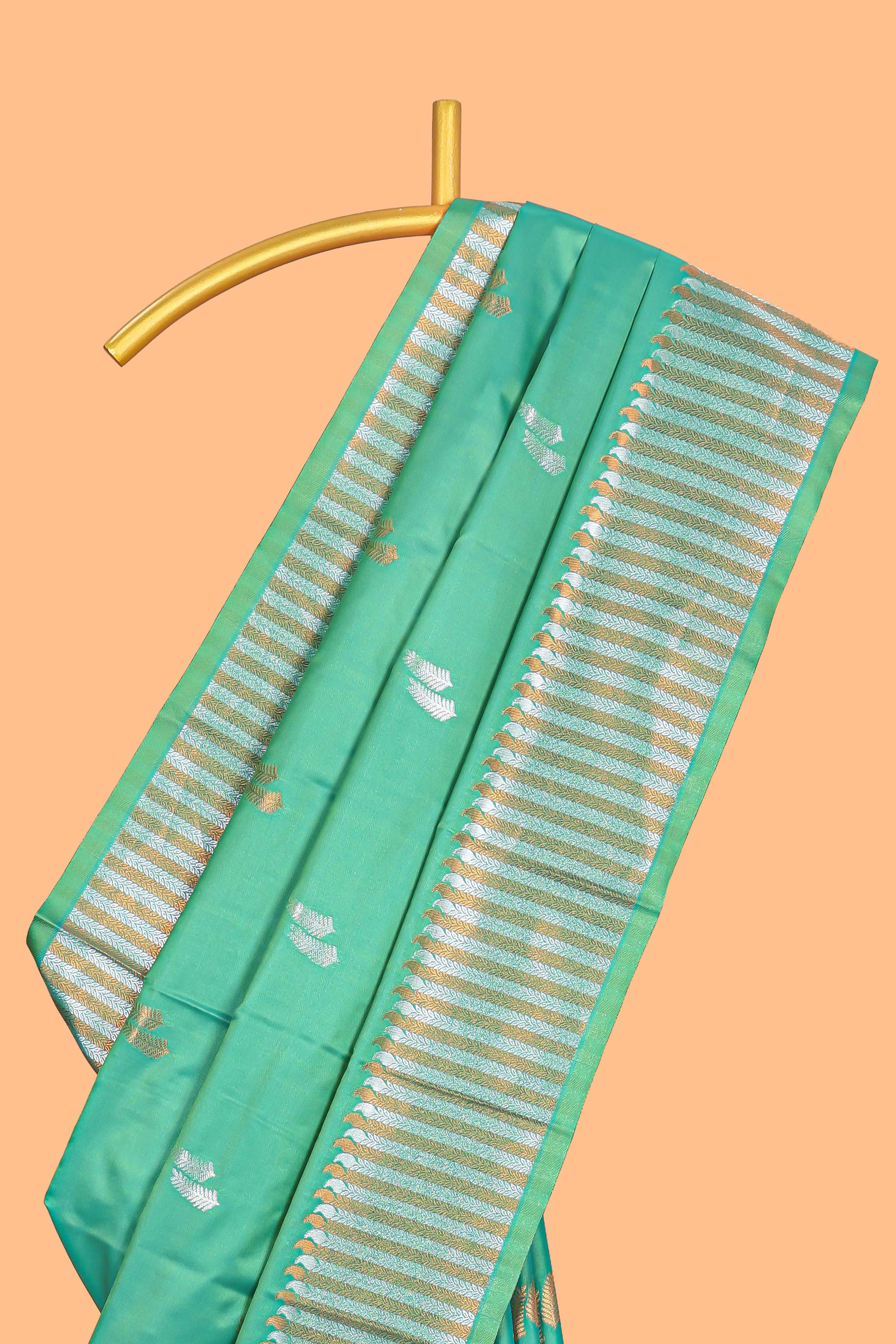 Green colour semi soft silk Woven Zari-Inspired Motifs and Geometric Weave Design border with contrast pallu and blouse