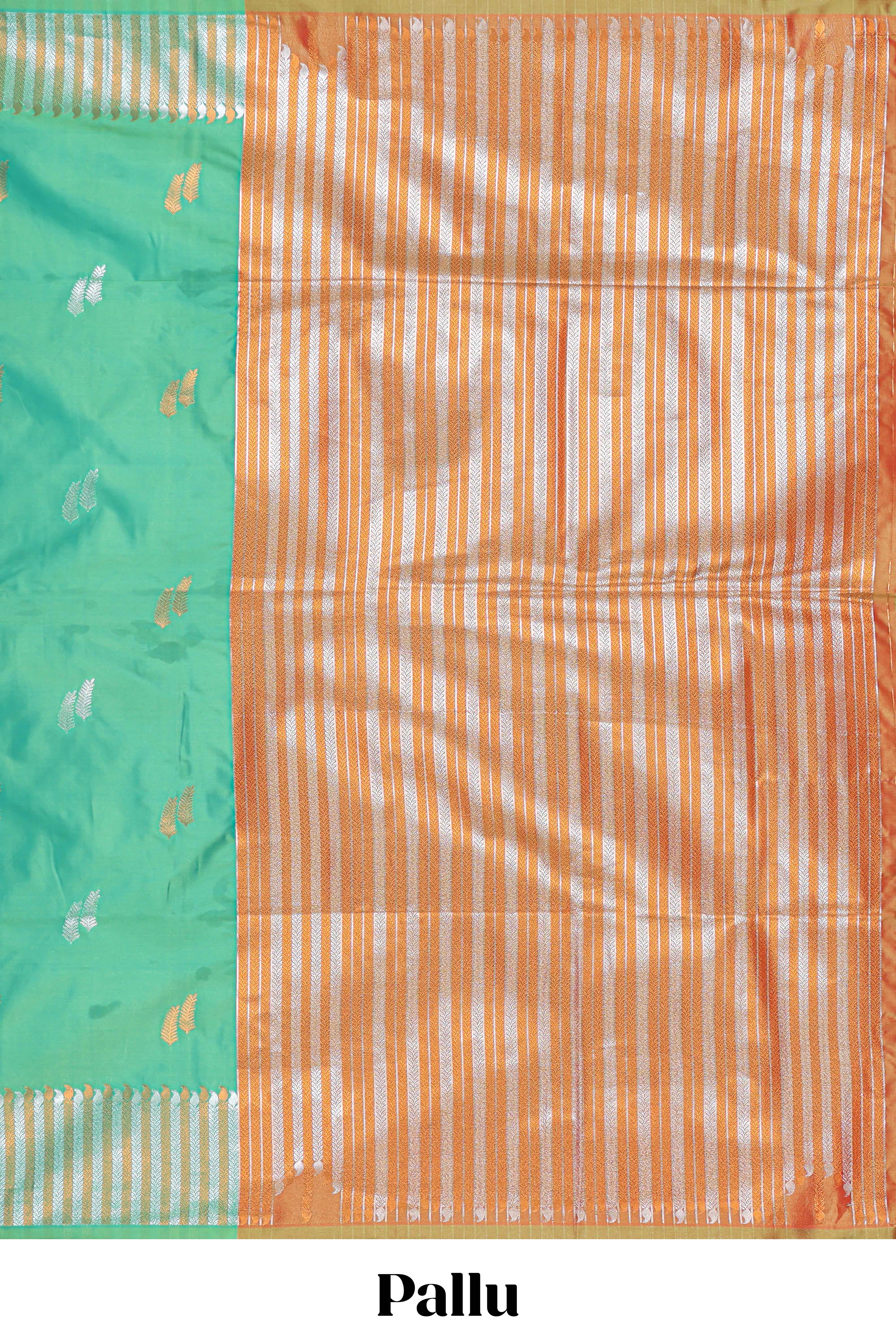 Green colour semi soft silk Woven Zari-Inspired Motifs and Geometric Weave Design border with contrast pallu and blouse