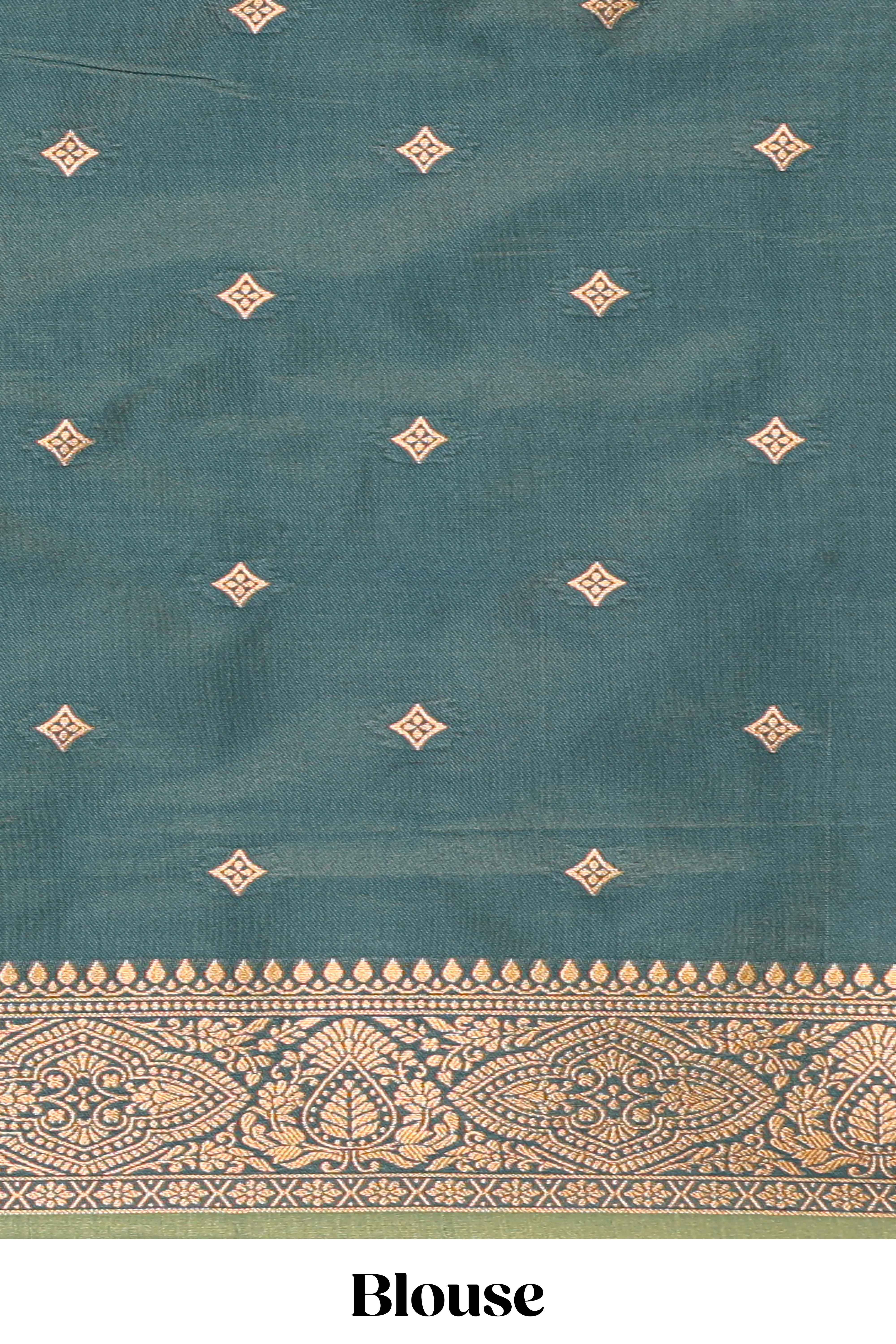 Green colour semi soft silk all over zari striped pattern with contrast zari weaving border and contrast buttas weaving blouse