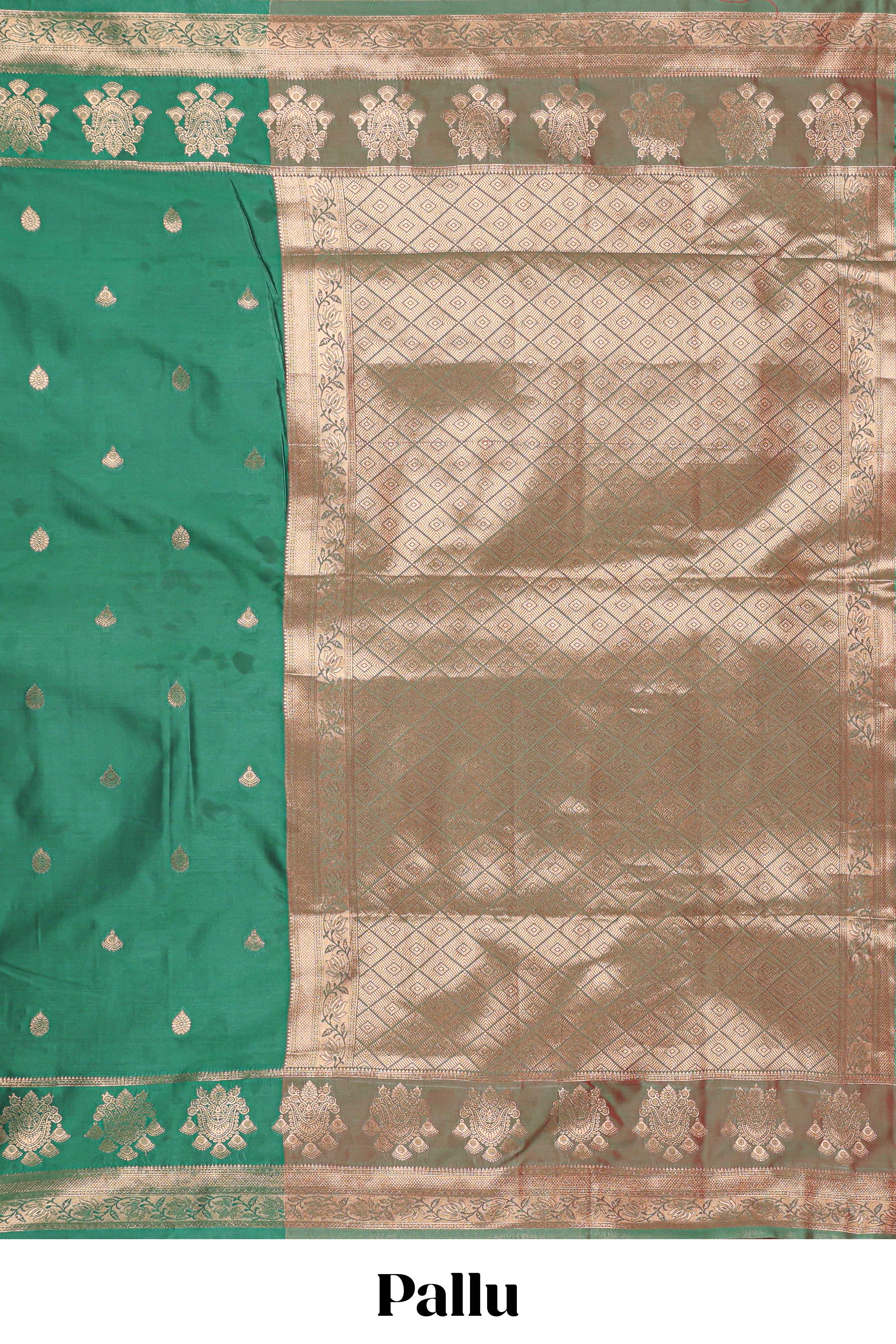 Bottle Green colour semi soft silk all over zari weave motifs with zari weaving border and contrast buttas weaving blouse
