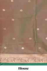 Bottle Green colour semi soft silk all over zari weave motifs with zari weaving border and contrast buttas weaving blouse