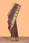 Brown colour semi soft silk all over checked pattern andContrast zari weaving border and Matching blouse