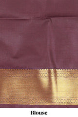 Brown colour semi soft silk all over checked pattern andContrast zari weaving border and Matching blouse