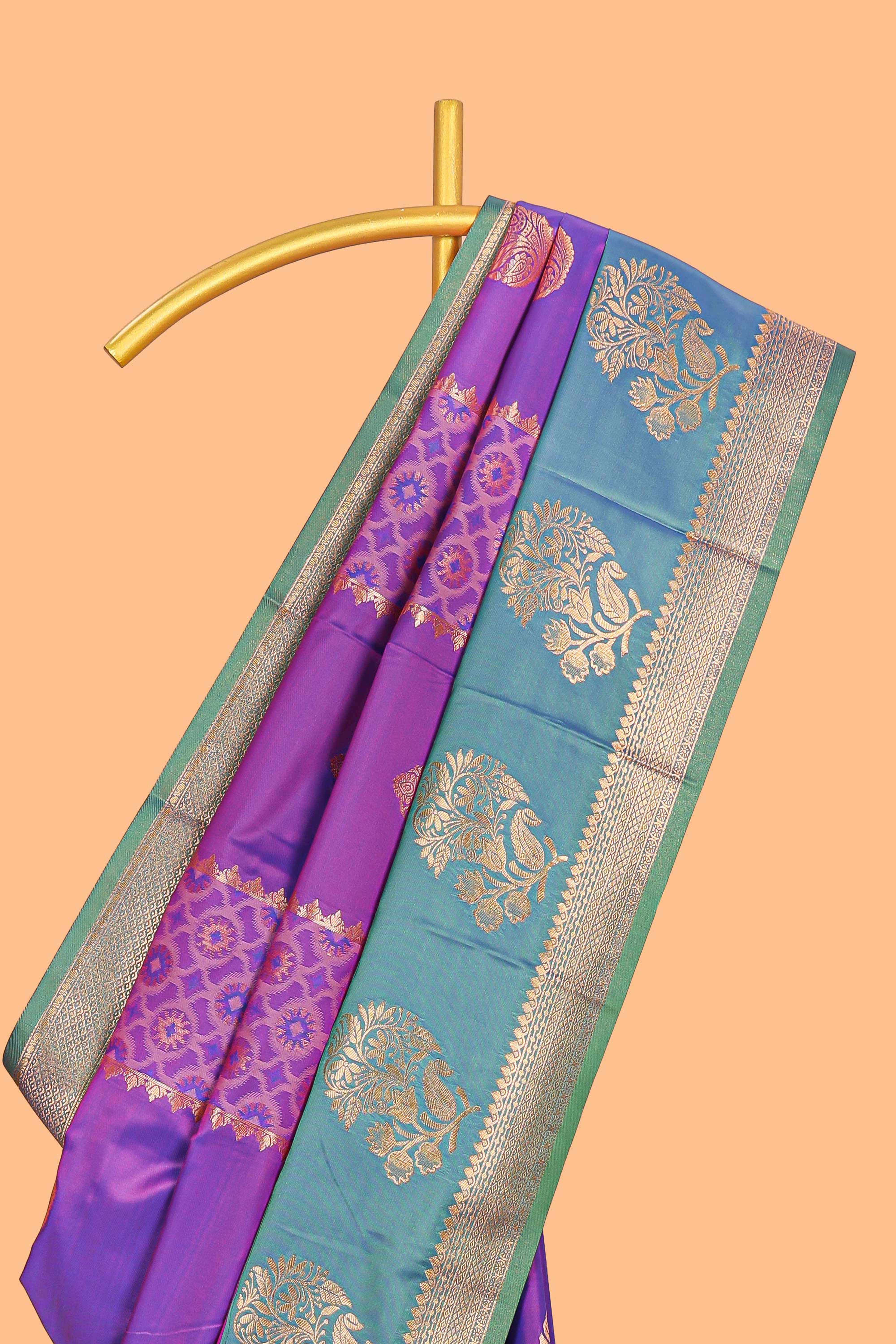 Royal Purple colour semi soft silk Zari-Woven Floral and Peacock Motifs with Gold-Tone Zari border and contrast buttas blouse