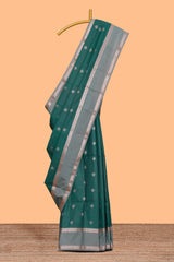 Green checked zari motifs design saree with self zari border and matching blouse