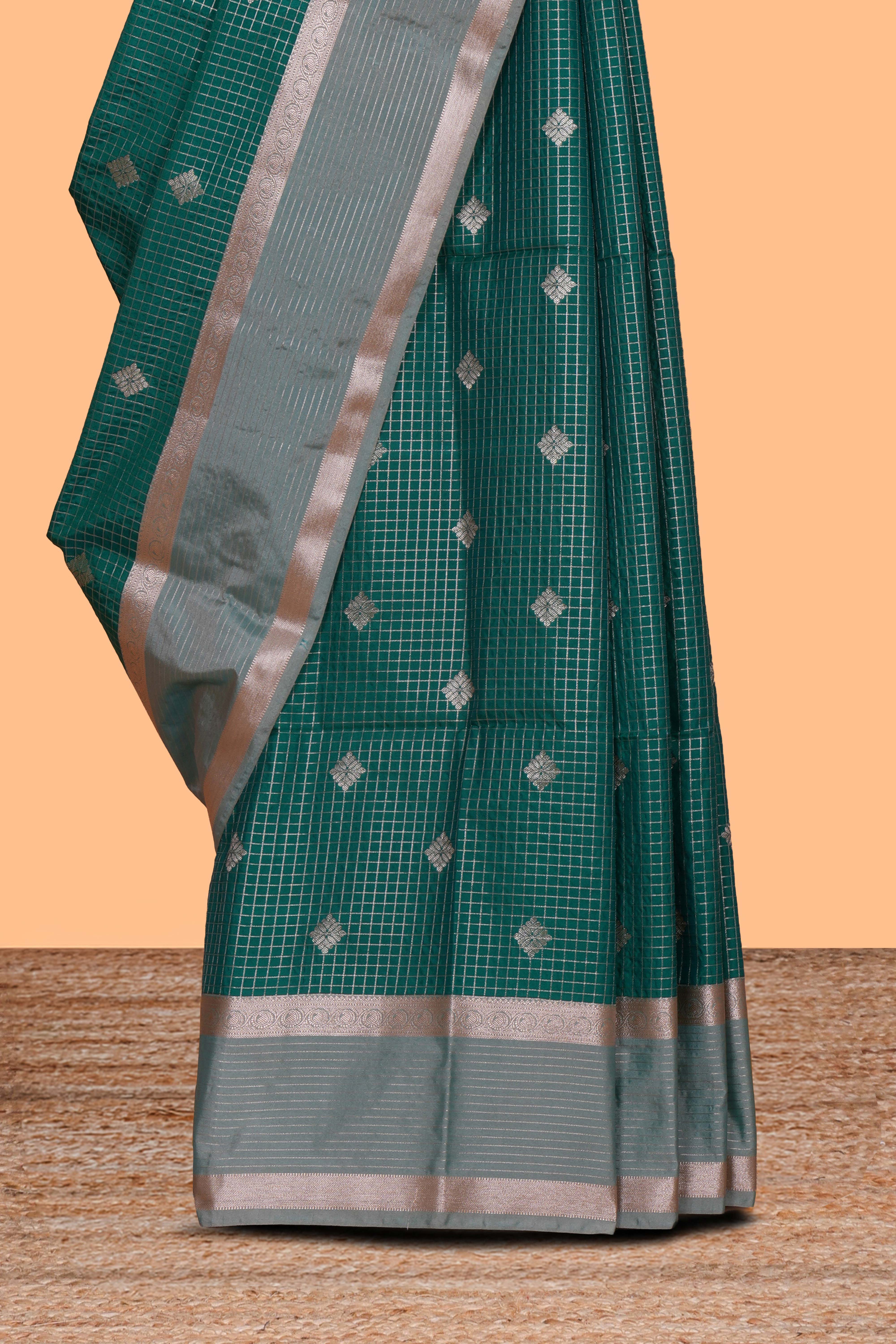 Green checked zari motifs design saree with self zari border and matching blouse