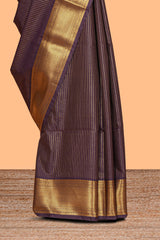Dark mauve zari checked design semi soft silk saree with self zari border and matching blouse
