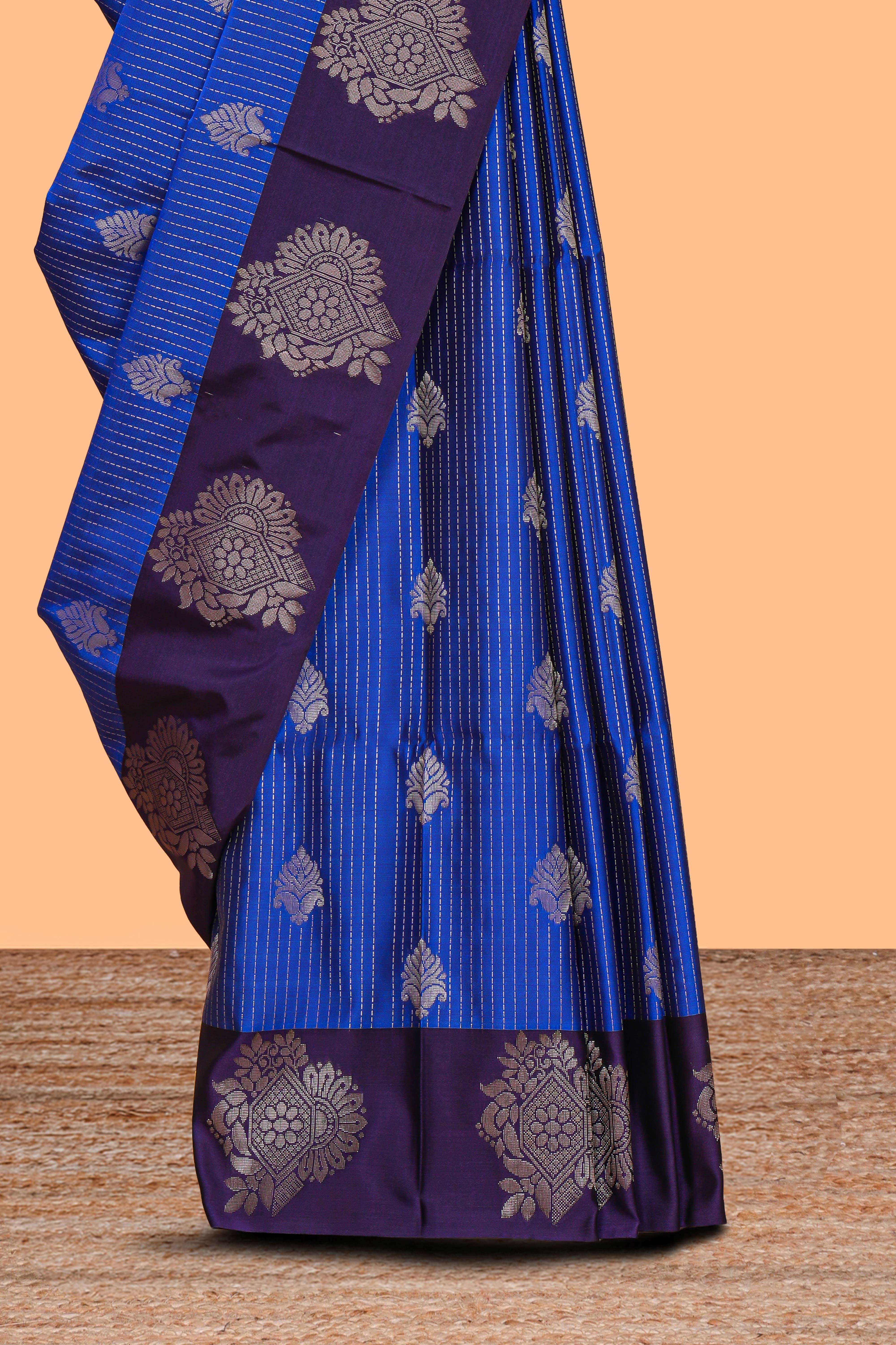 Blue zari striped & floral motifs design semi soft silk saree with contrast zari border and plain blouse