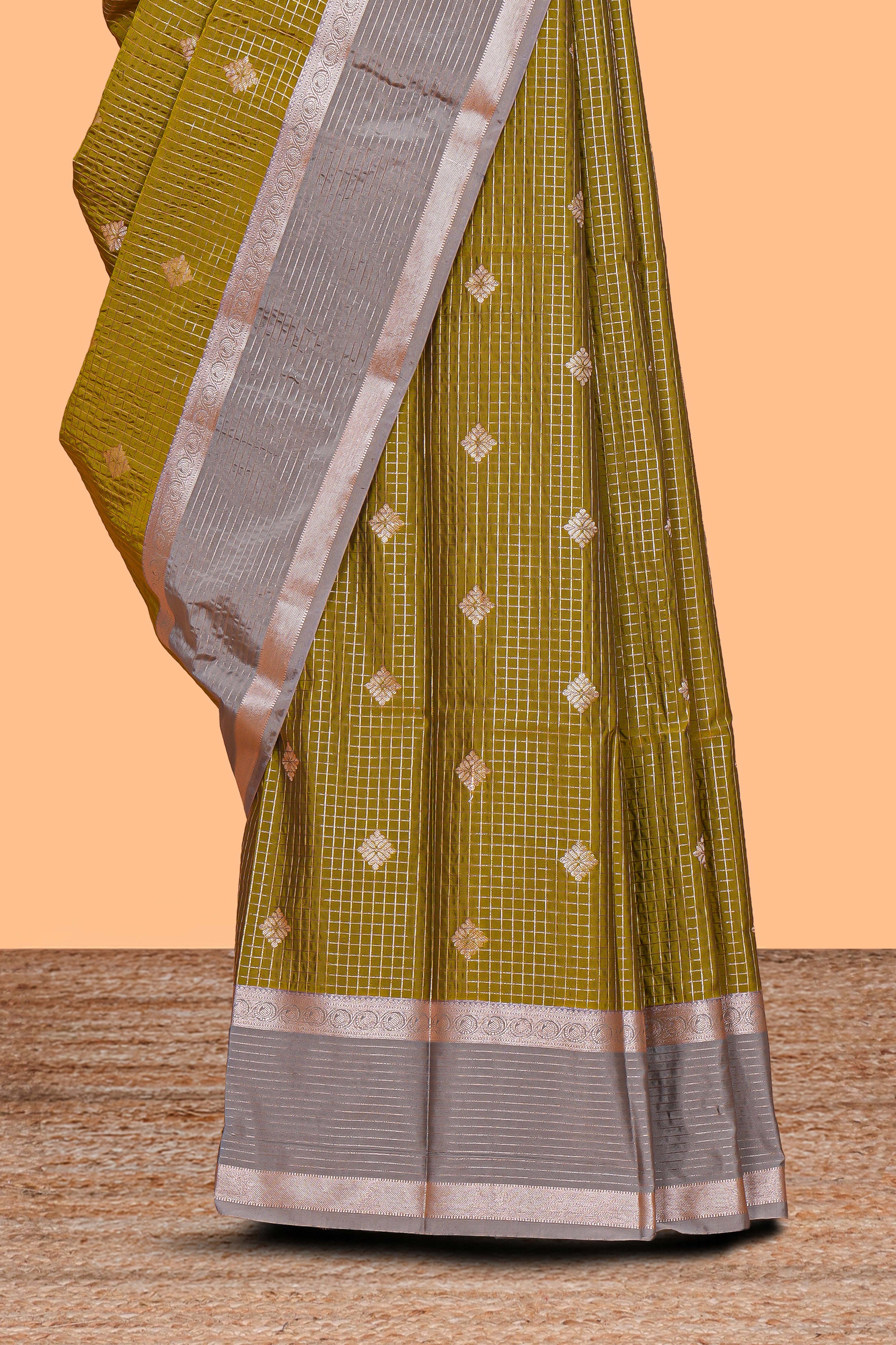 Mustard zari checked motifs design semi soft silk saree with contrast border and blouse