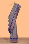 Grey zari striped motifs design semi soft silk saree with contrast border and blouse