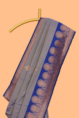 Grey zari striped motifs design semi soft silk saree with contrast border and blouse