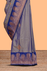 Grey zari striped motifs design semi soft silk saree with contrast border and blouse