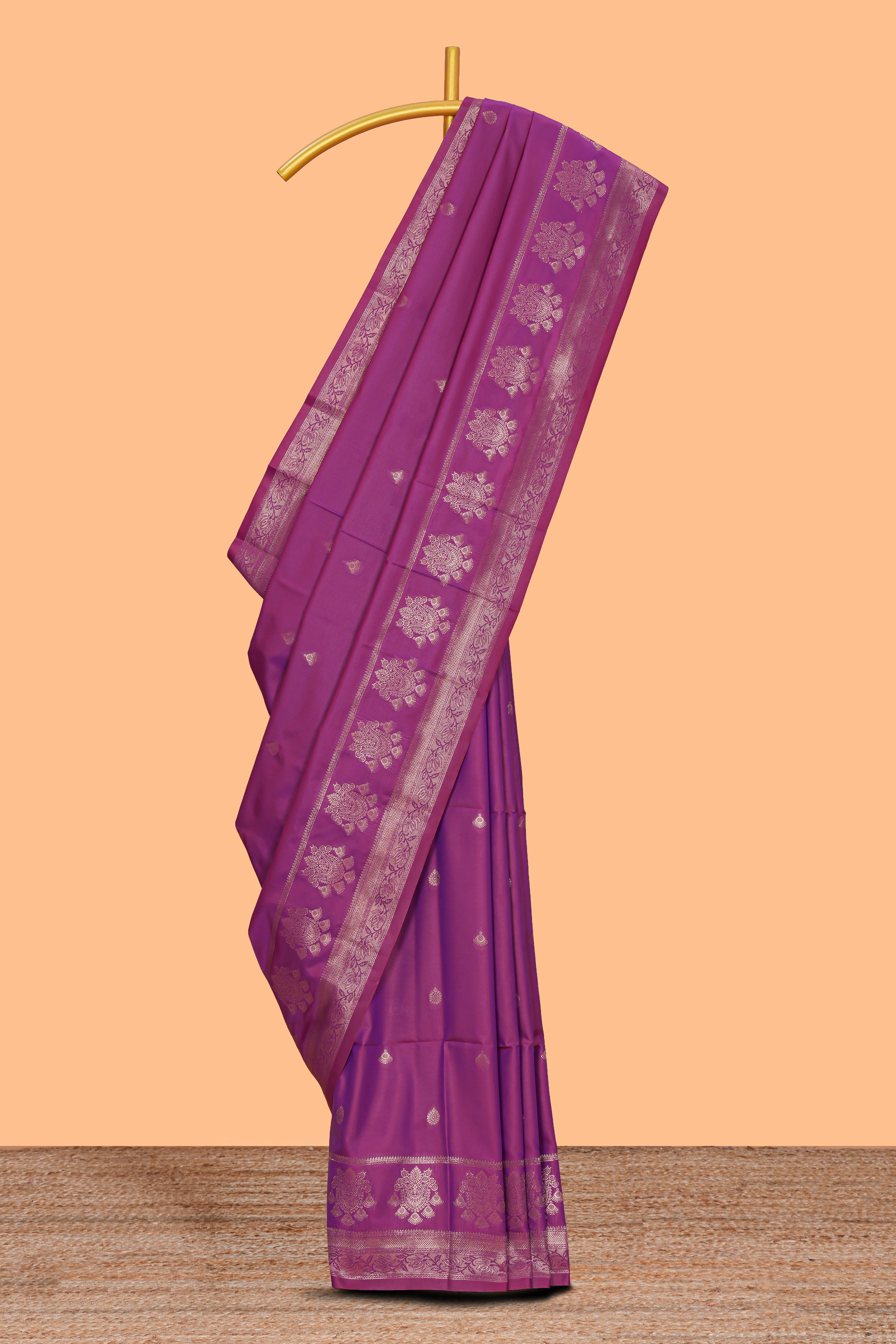 Magenta zari motifs design semi soft silk saree with self zari border and contrast blouse