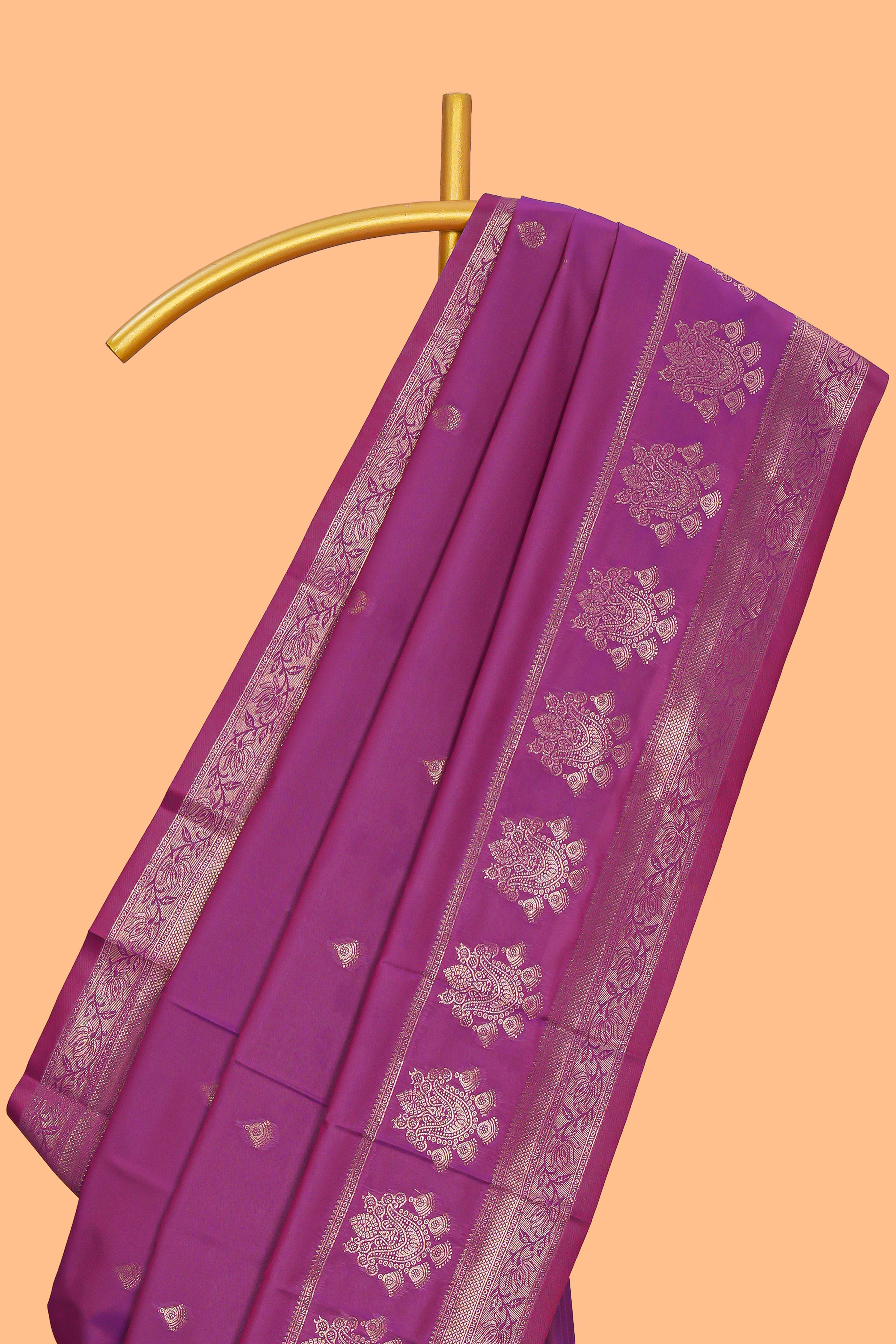 Magenta zari motifs design semi soft silk saree with self zari border and contrast blouse