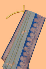 Tempered grey striped zari motifs design semi soft silk saree with contrast zari border and motifs blouse