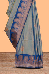 Tempered grey striped zari motifs design semi soft silk saree with contrast zari border and motifs blouse