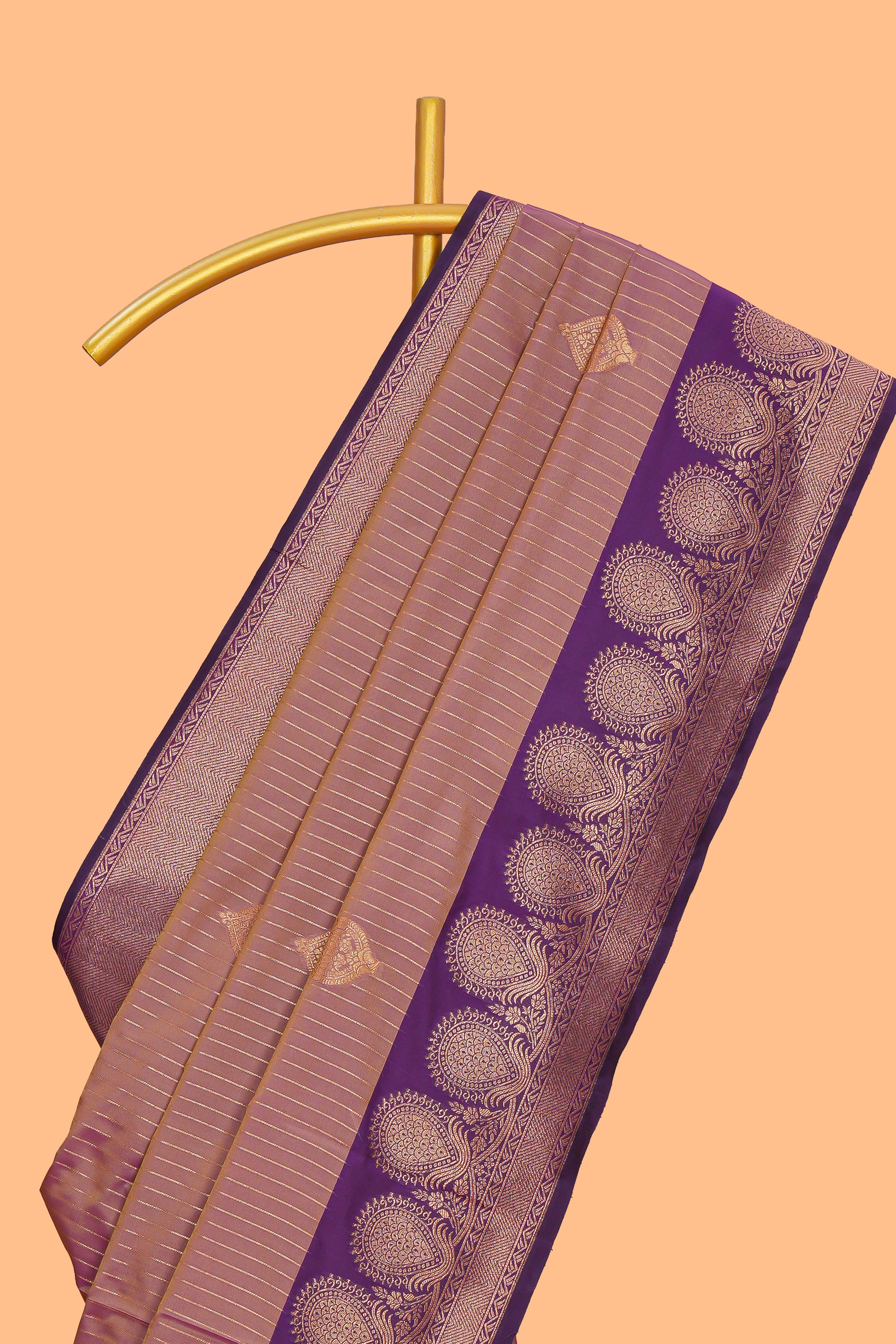 Dark peach striped zari motifs design semi soft silk saree with contrast zari border and motifs blouse