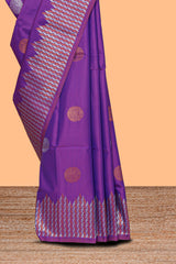 Electric lavender zari motifs design semi soft silk saree with self zari border and contrast motifs blouse