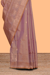 Faded peach zari motifs design semi soft silk saree with self zari border and contrast zari blouse