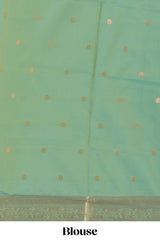 Faded peach zari motifs design semi soft silk saree with self zari border and contrast zari blouse