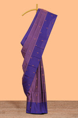 Mauve purple striped zari motifs design semi soft silk saree with contrast checked border andzari striped blouse