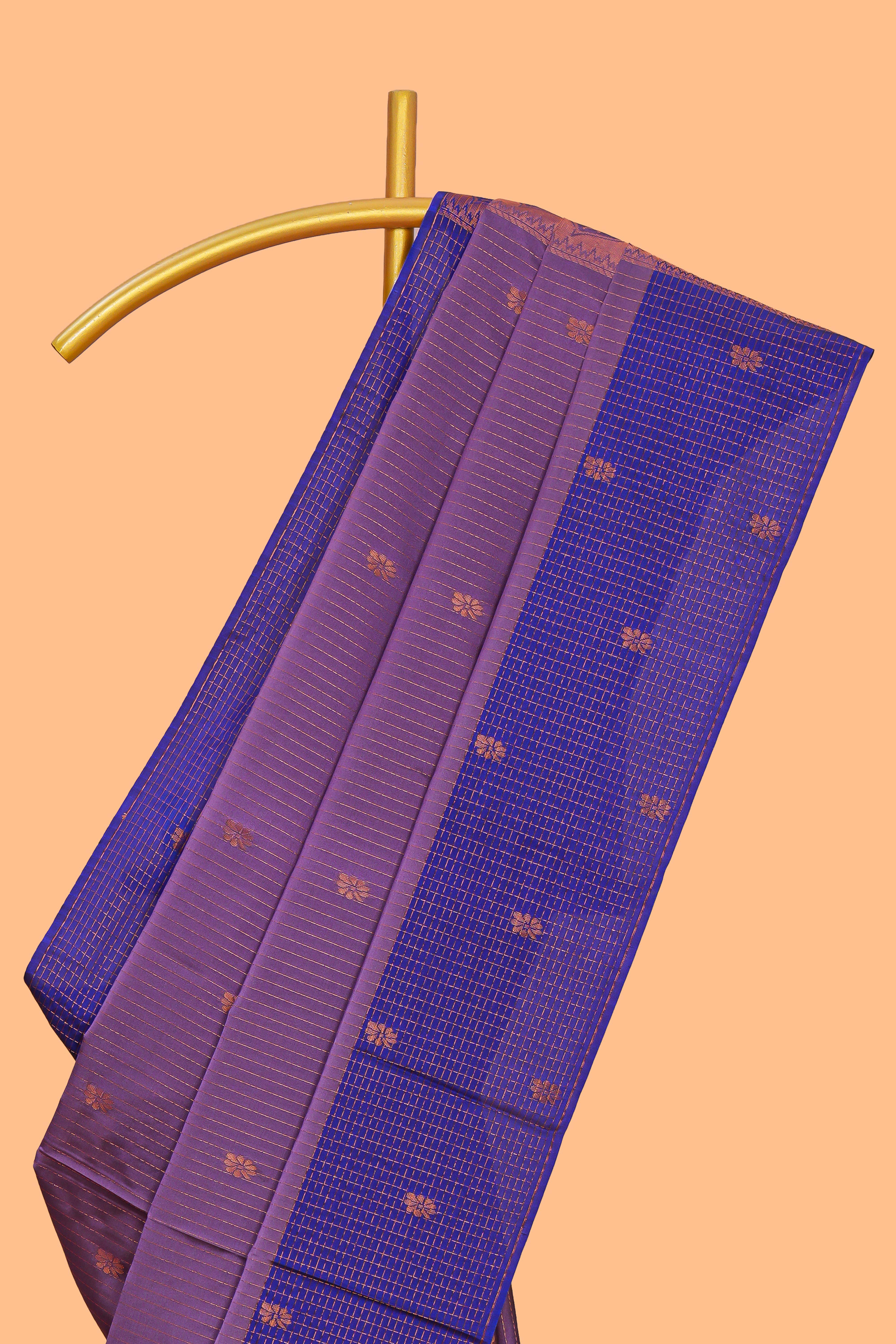 Mauve purple striped zari motifs design semi soft silk saree with contrast checked border andzari striped blouse