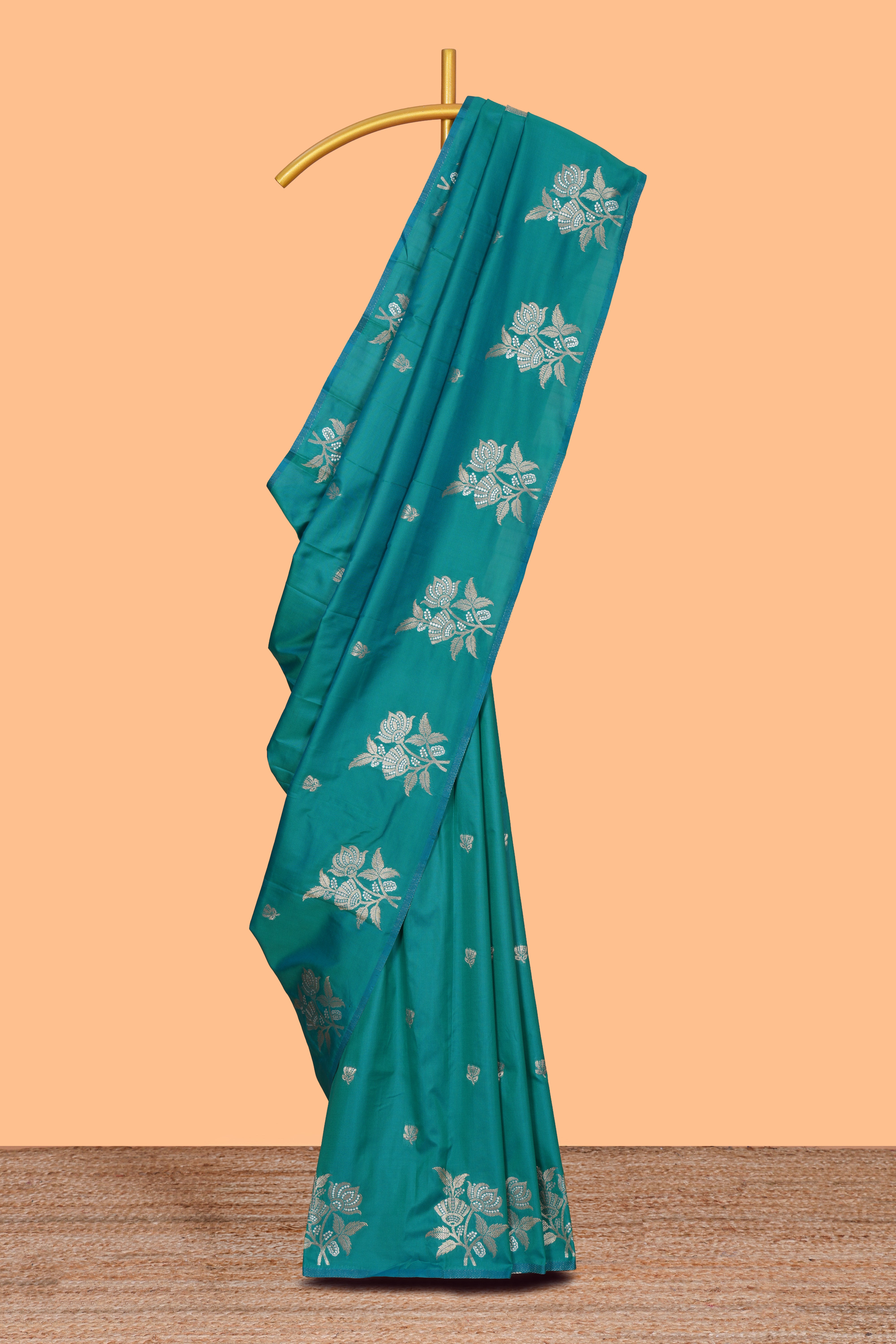 Borderless green floral zari motifs design semi soft silk saree with self pallu and matching blouse