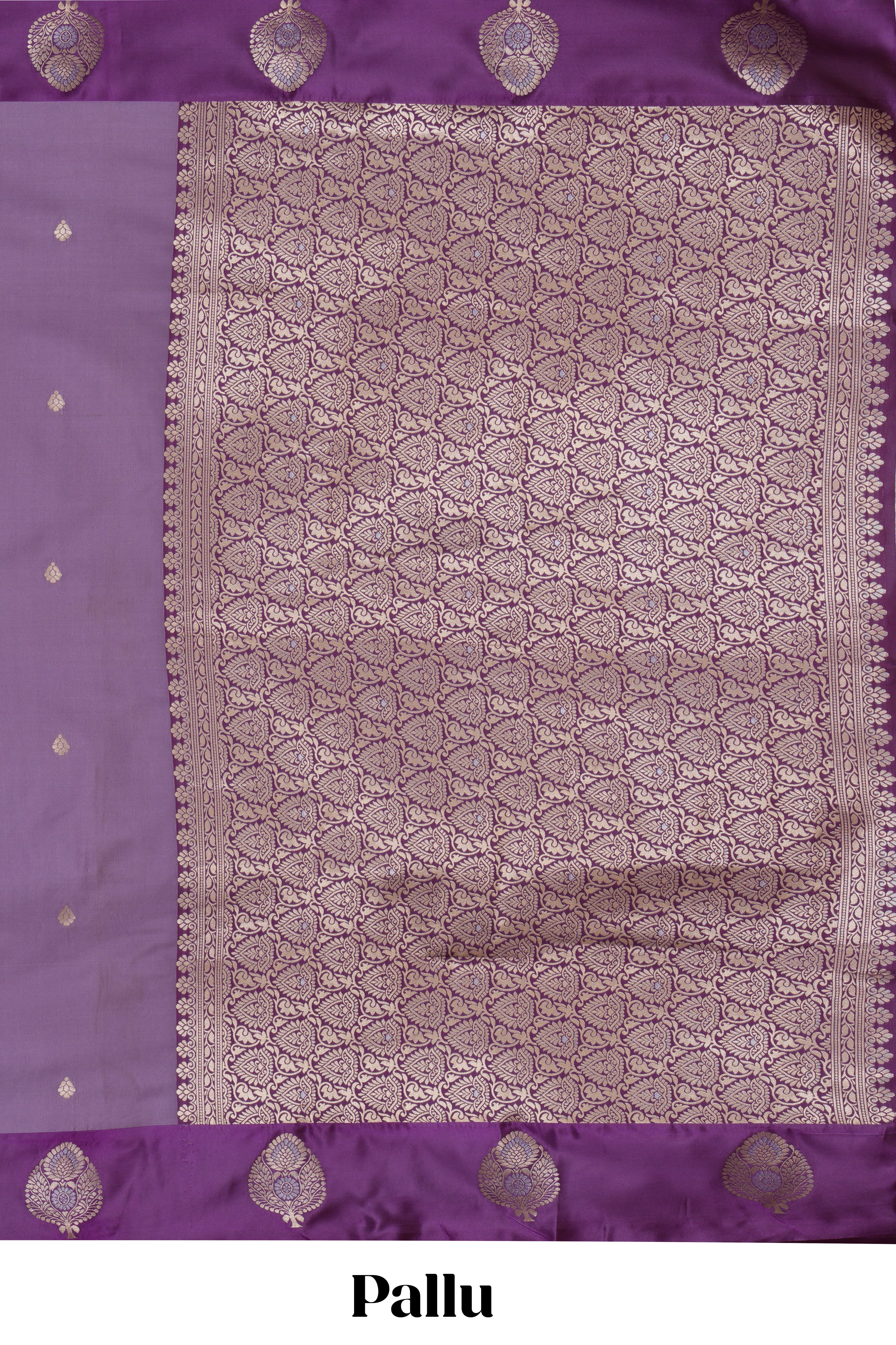 Lavender zari motifs design semi soft silk saree with contrast border and zari pallu
