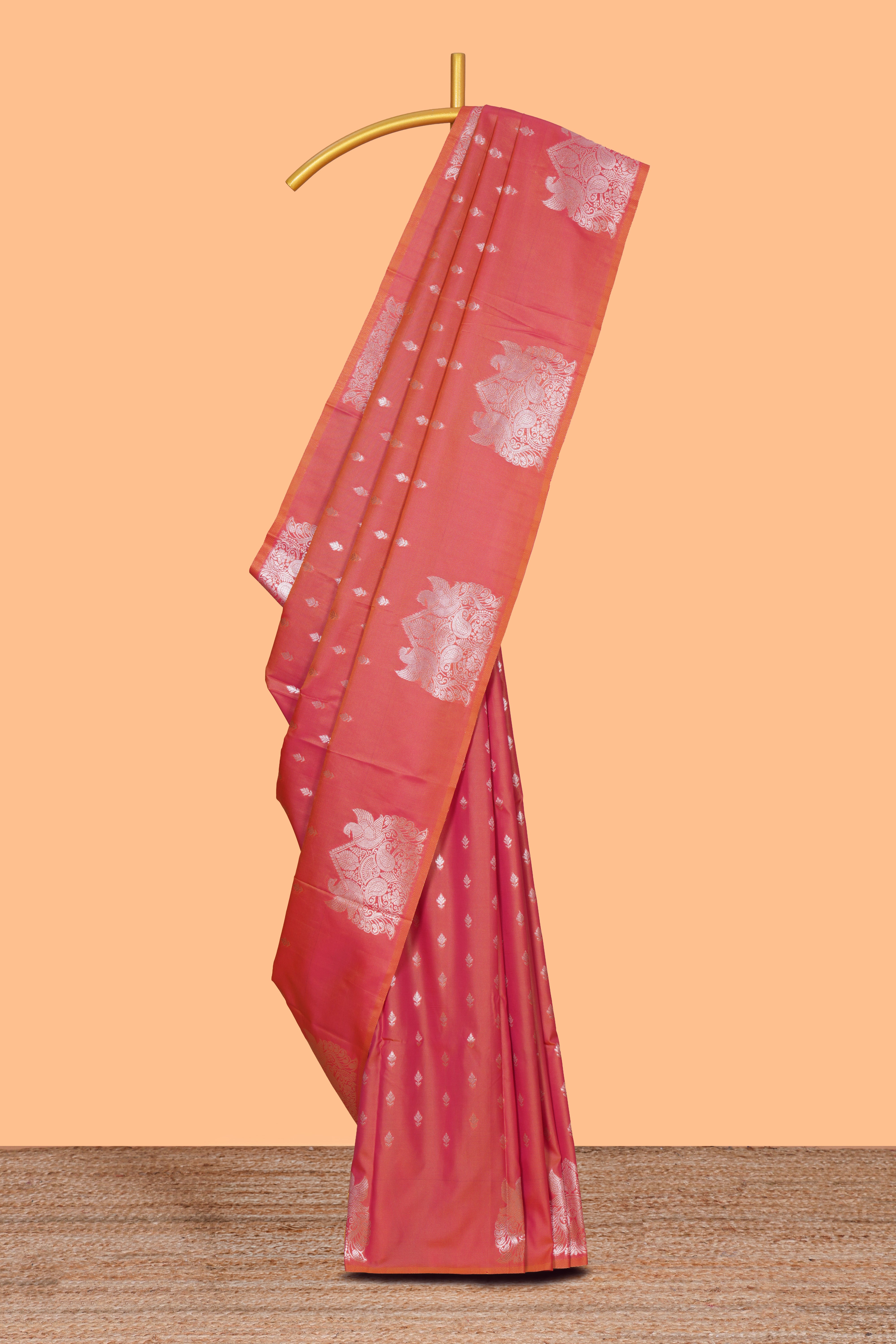 Borderless orange zari motifs design semi soft silk saree with self pallu and matching blouse