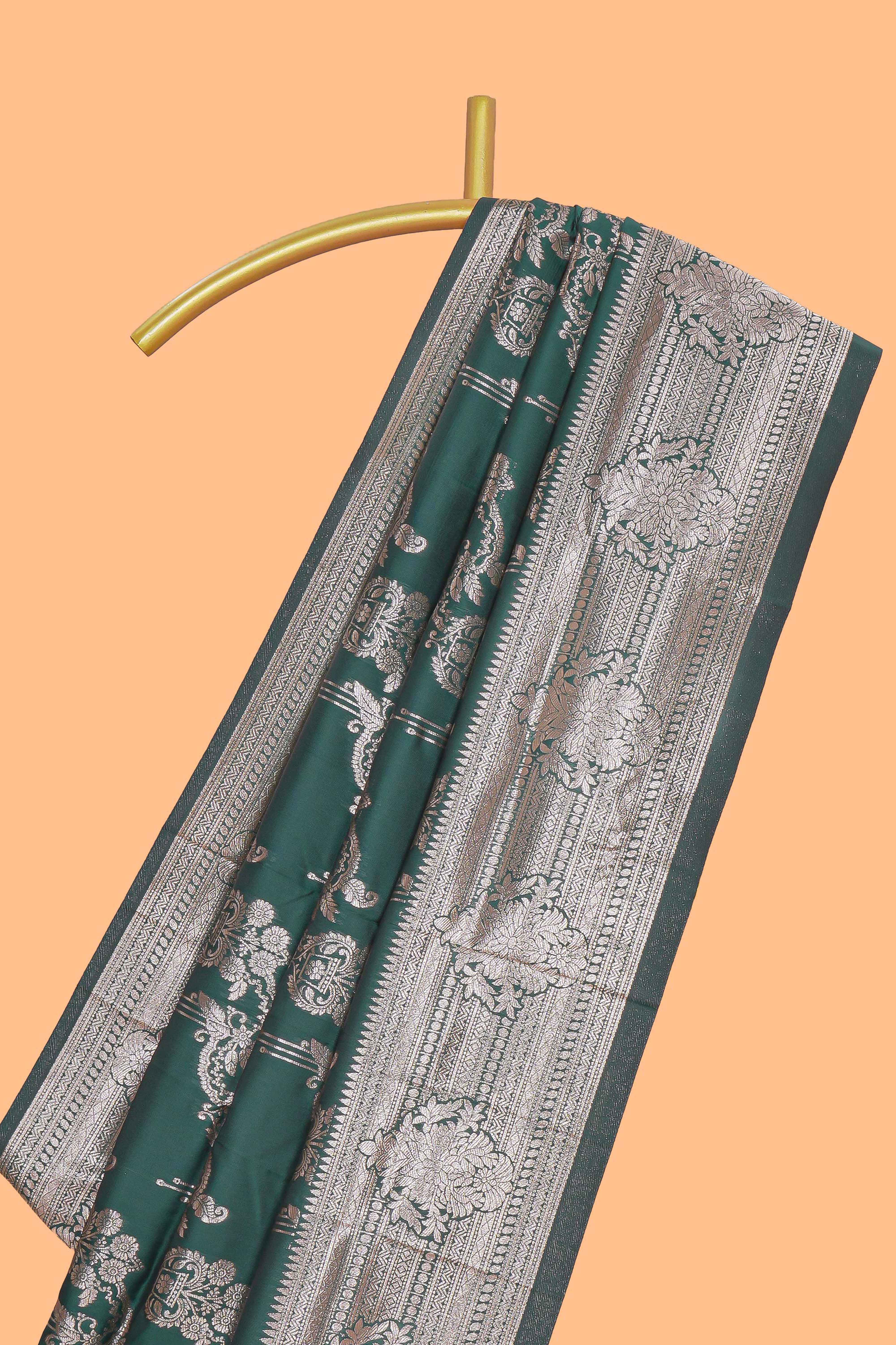 Green zari design semi soft silk saree with self zari border and matching blouse
