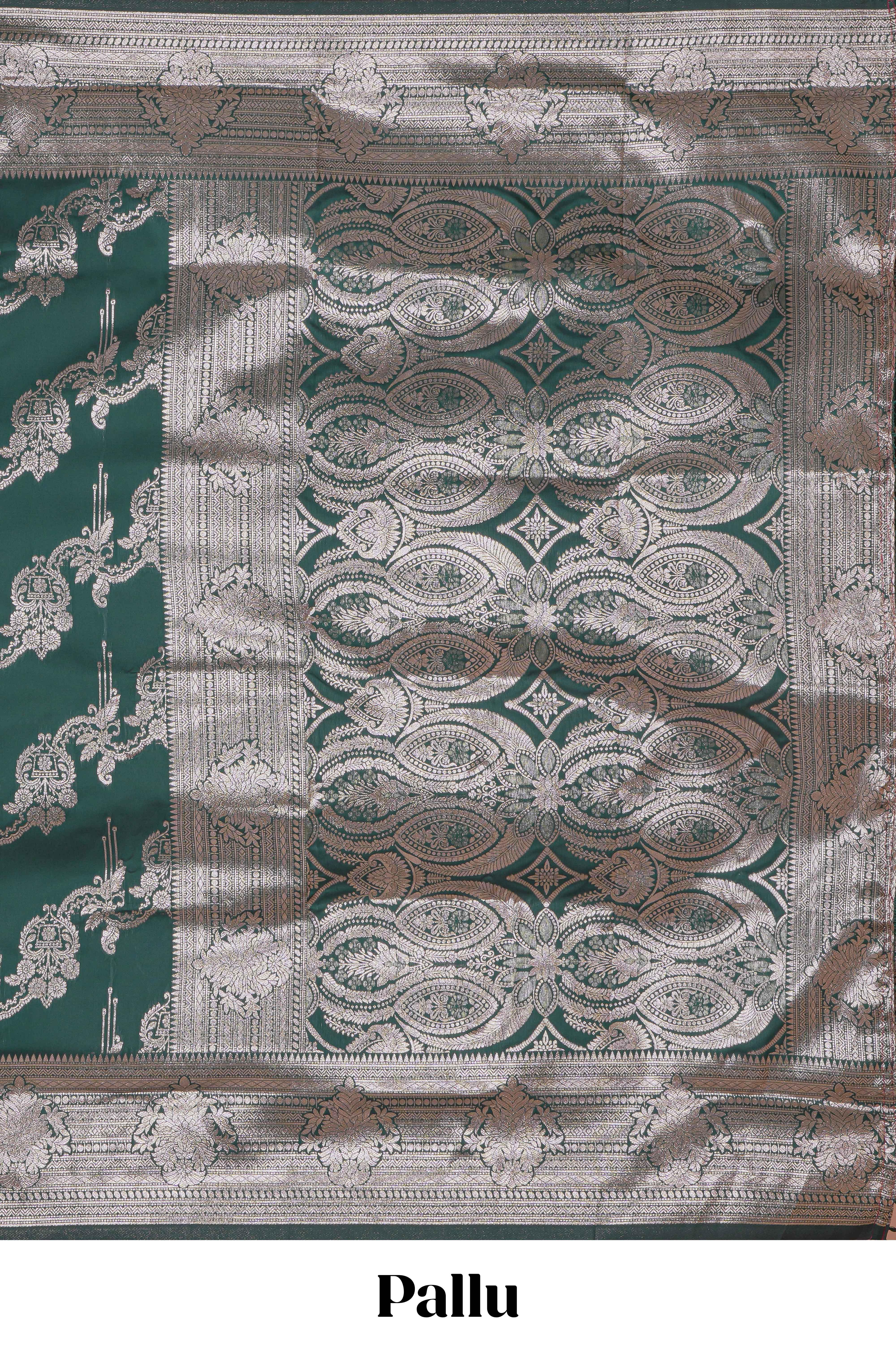 Green zari design semi soft silk saree with self zari border and matching blouse