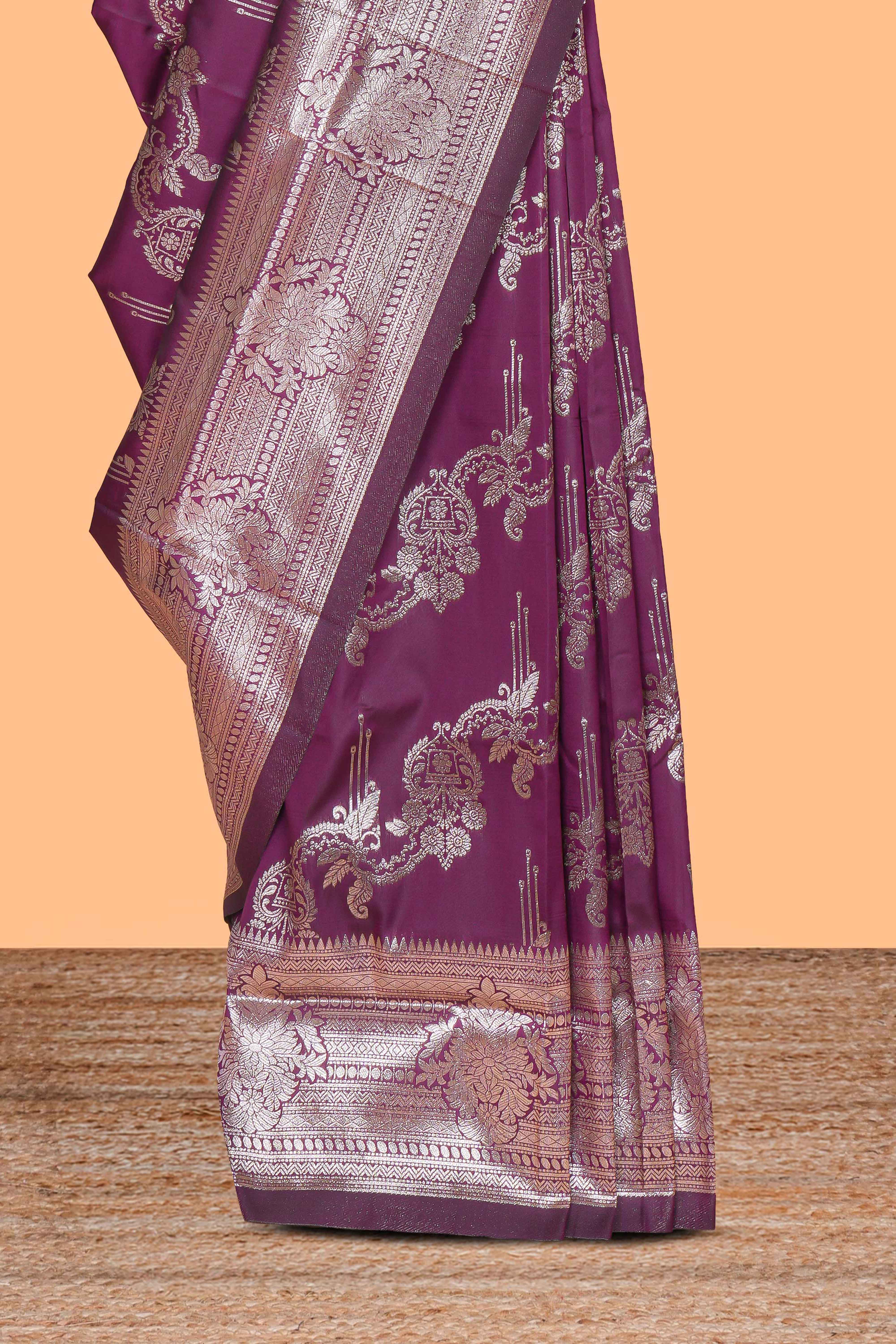 Purple zari design semi soft silk saree with self zari border and matching blouse