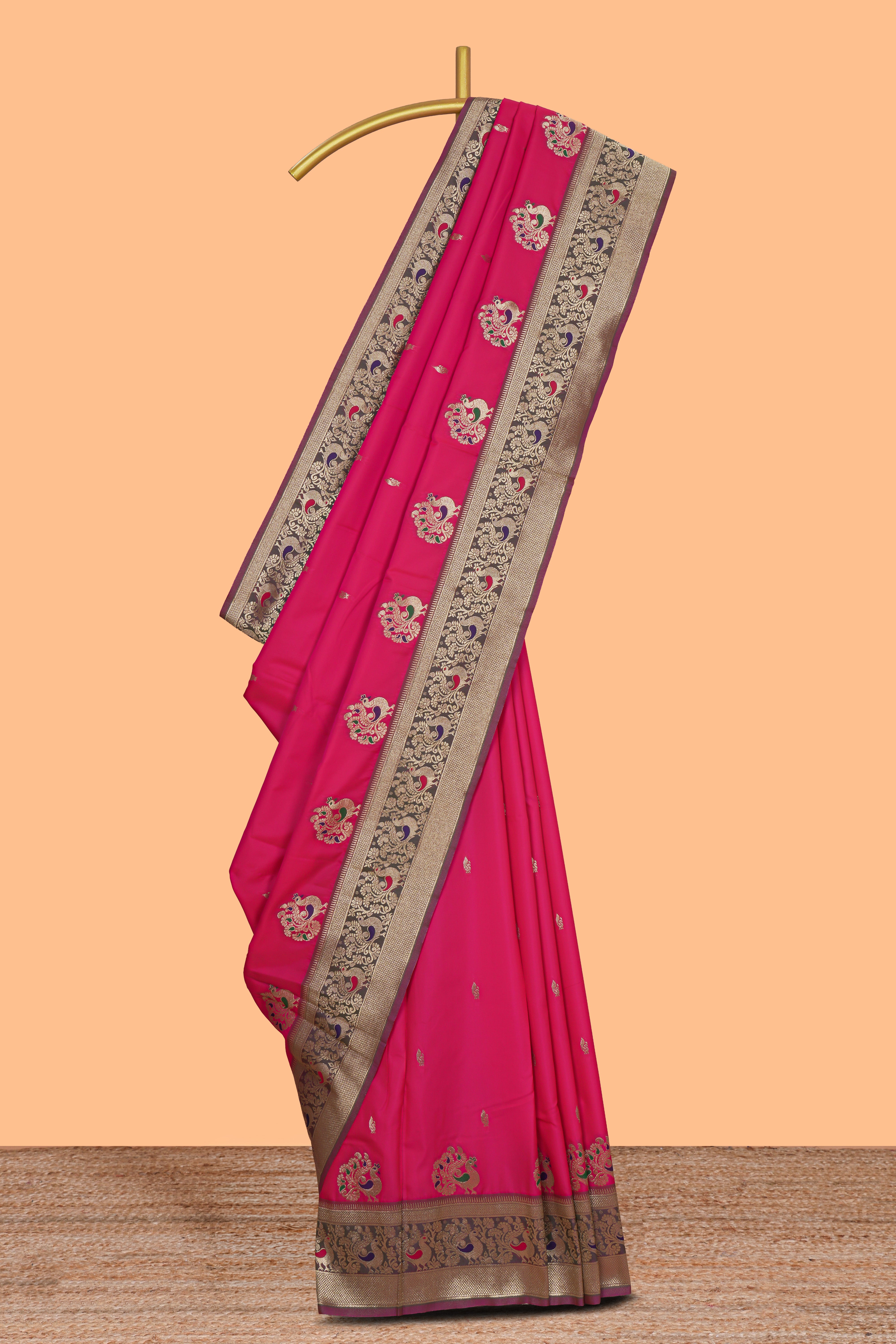Rani pink peacock design zari motifs semi soft silk saree with contrast zari border and blouse