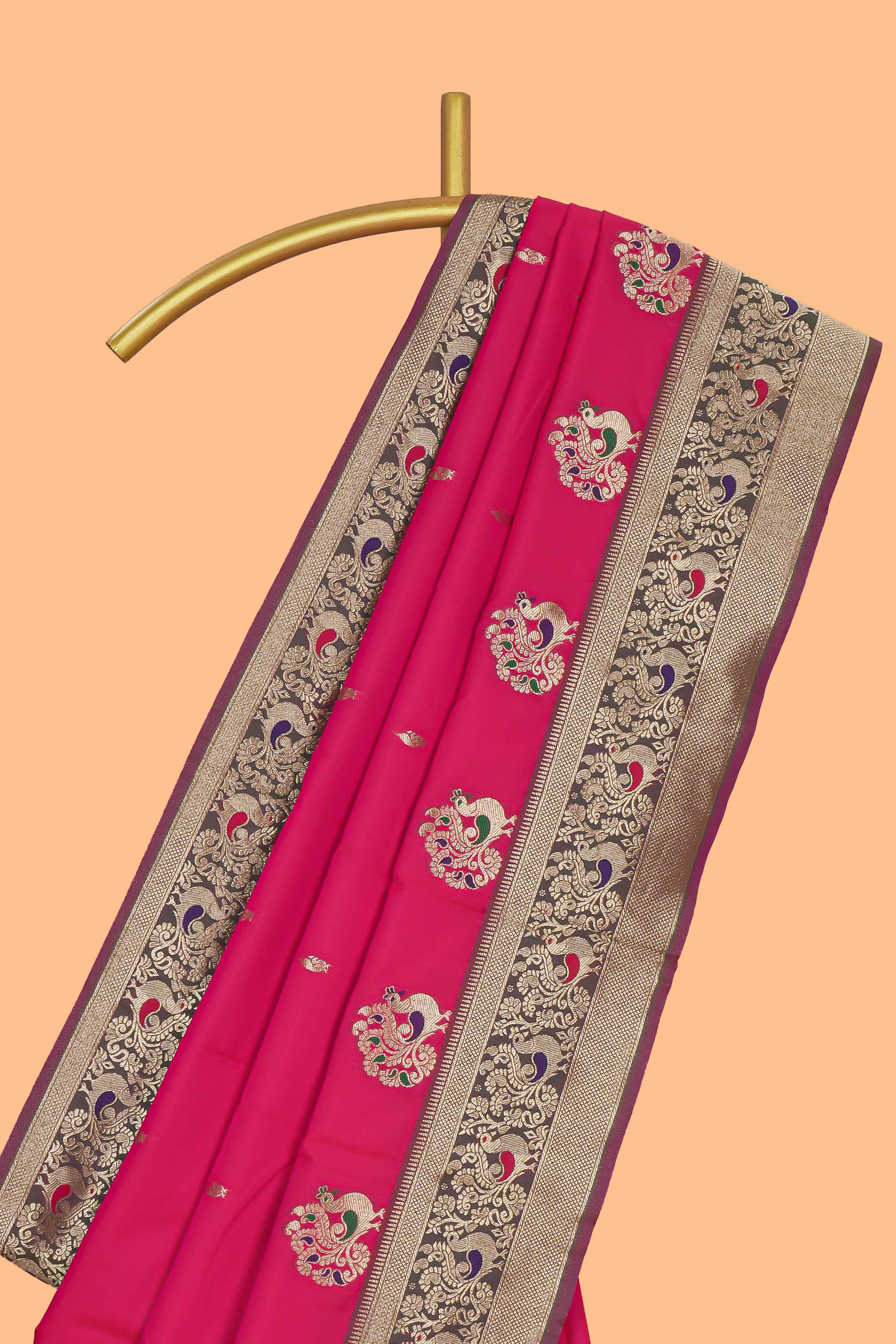 Rani pink peacock design zari motifs semi soft silk saree with contrast zari border and blouse
