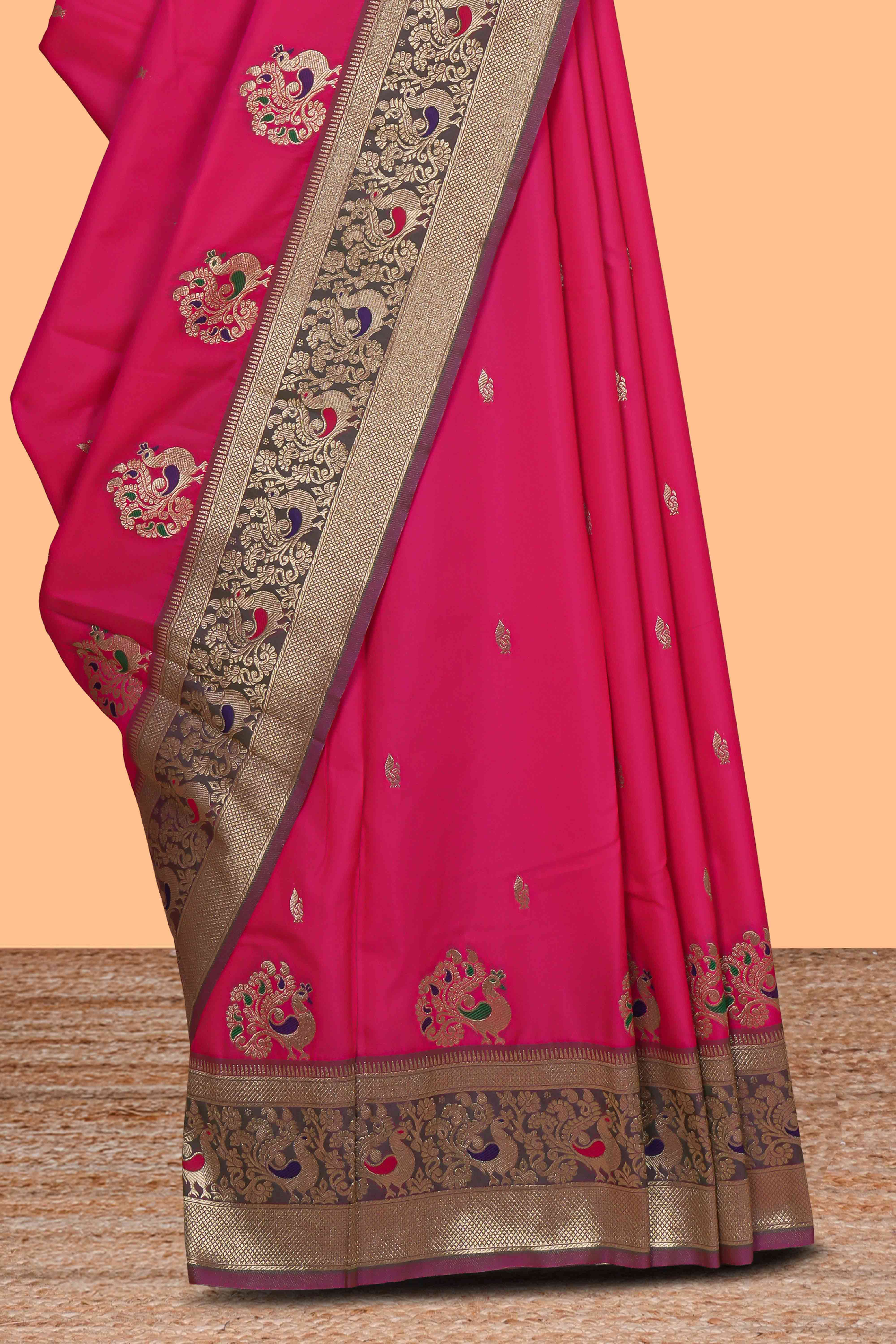 Rani pink peacock design zari motifs semi soft silk saree with contrast zari border and blouse