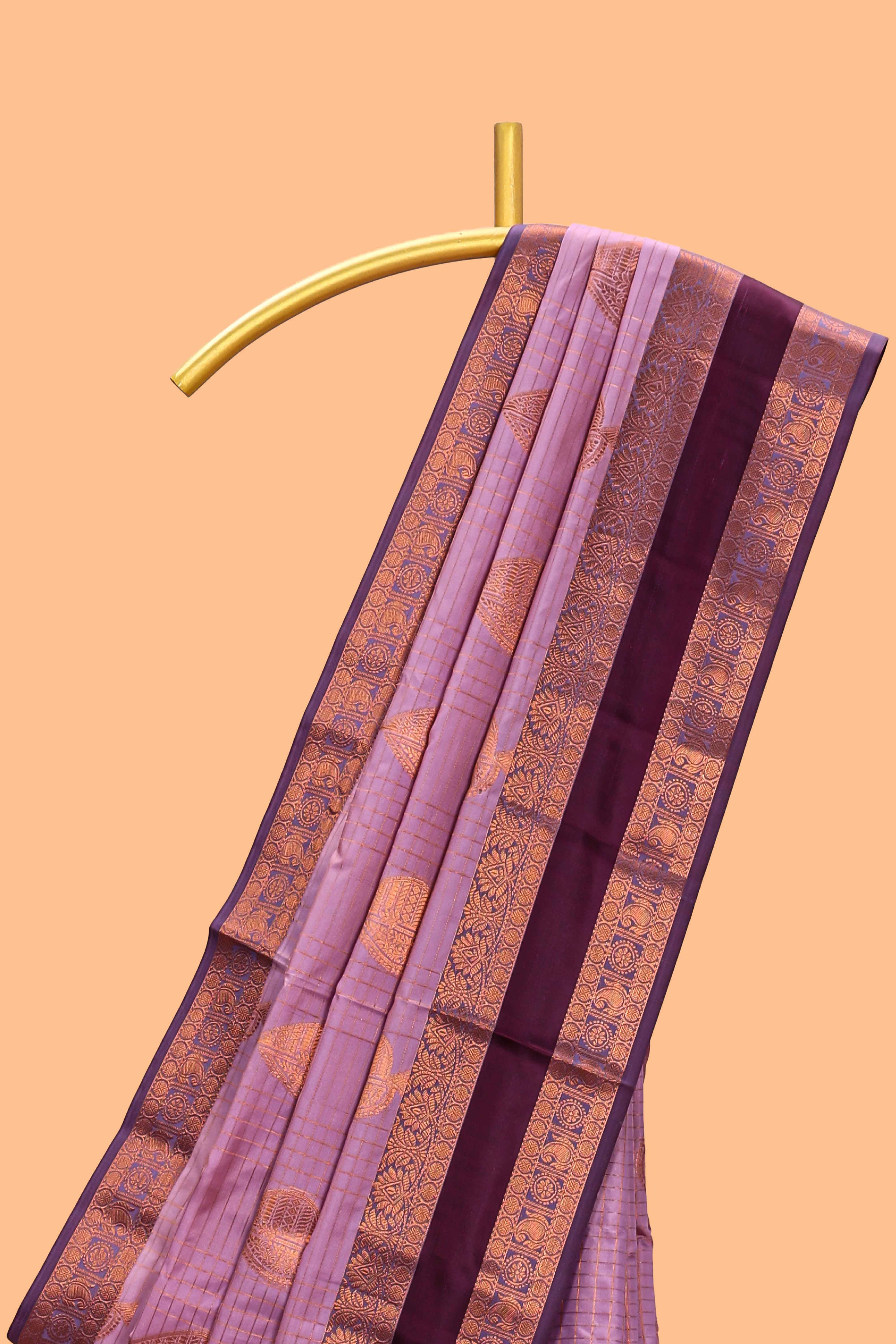 Lavender checked zari motifs design semi soft silk saree with contrast border and zari blouse