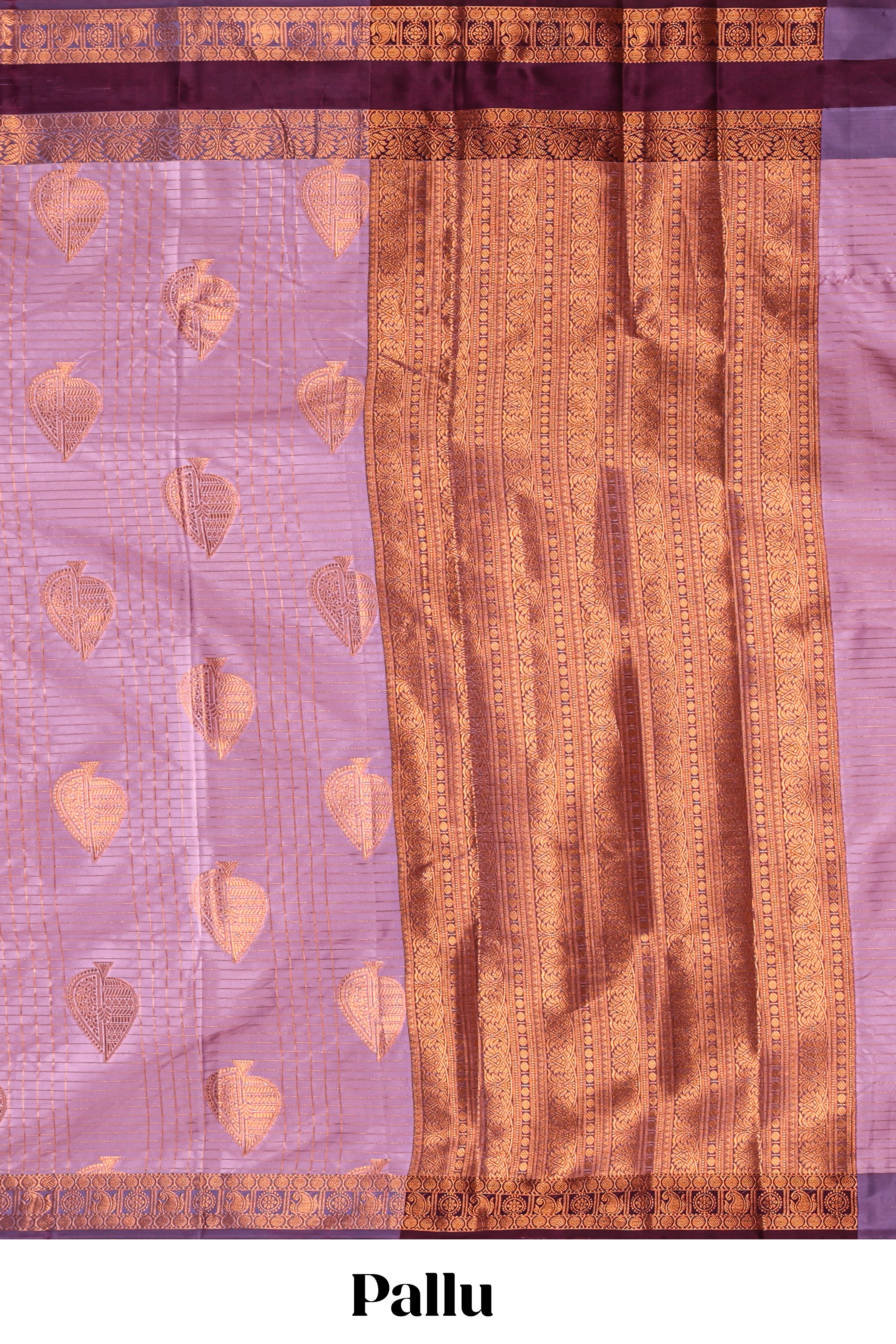 Lavender checked zari motifs design semi soft silk saree with contrast border and zari blouse