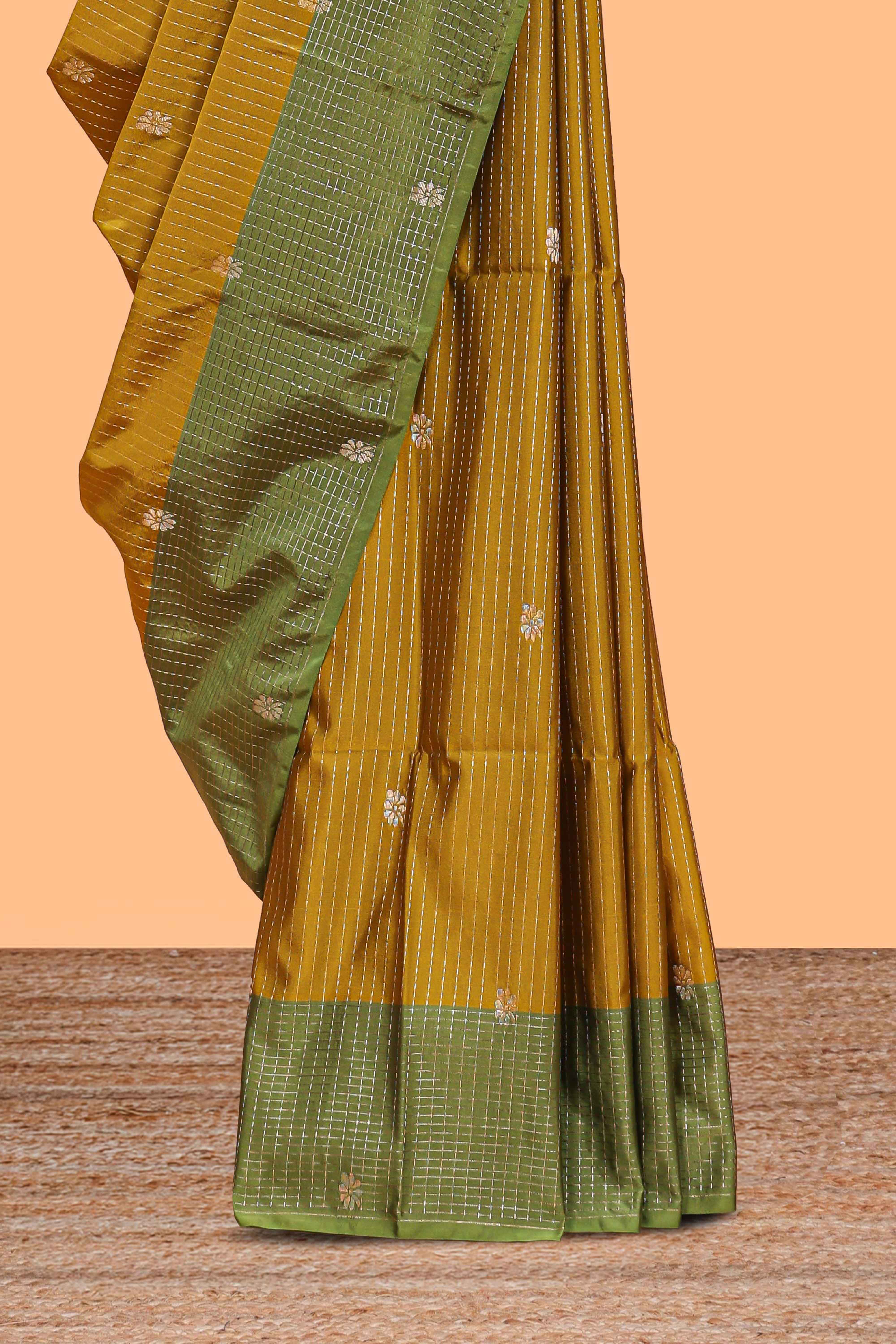 Mustard striped floral zari motifs design semi soft silk saree with contrast zari border and blouse
