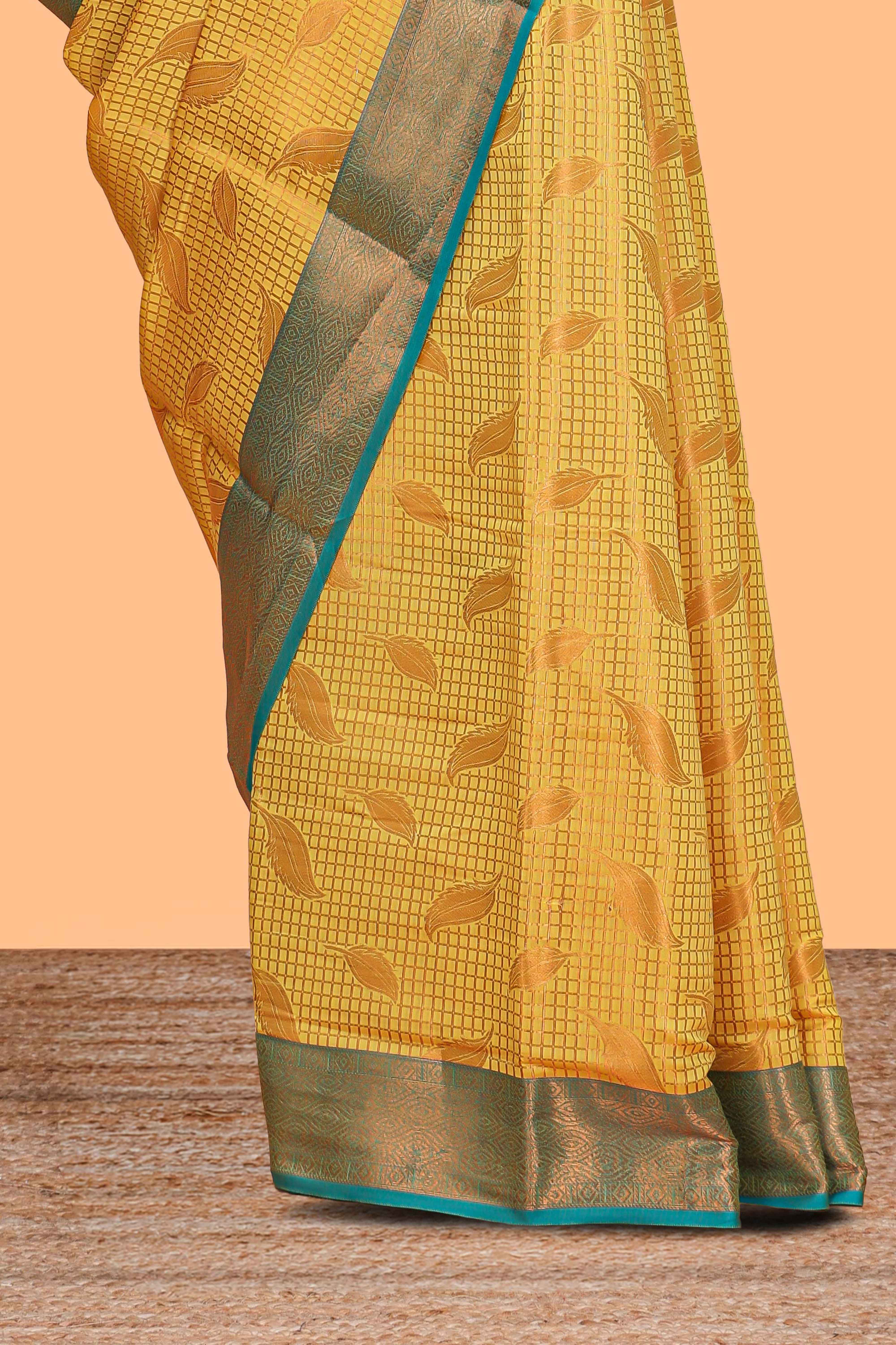 Mustard checked leaf zari motifs design semi soft silk saree with contrast zari border and blouse